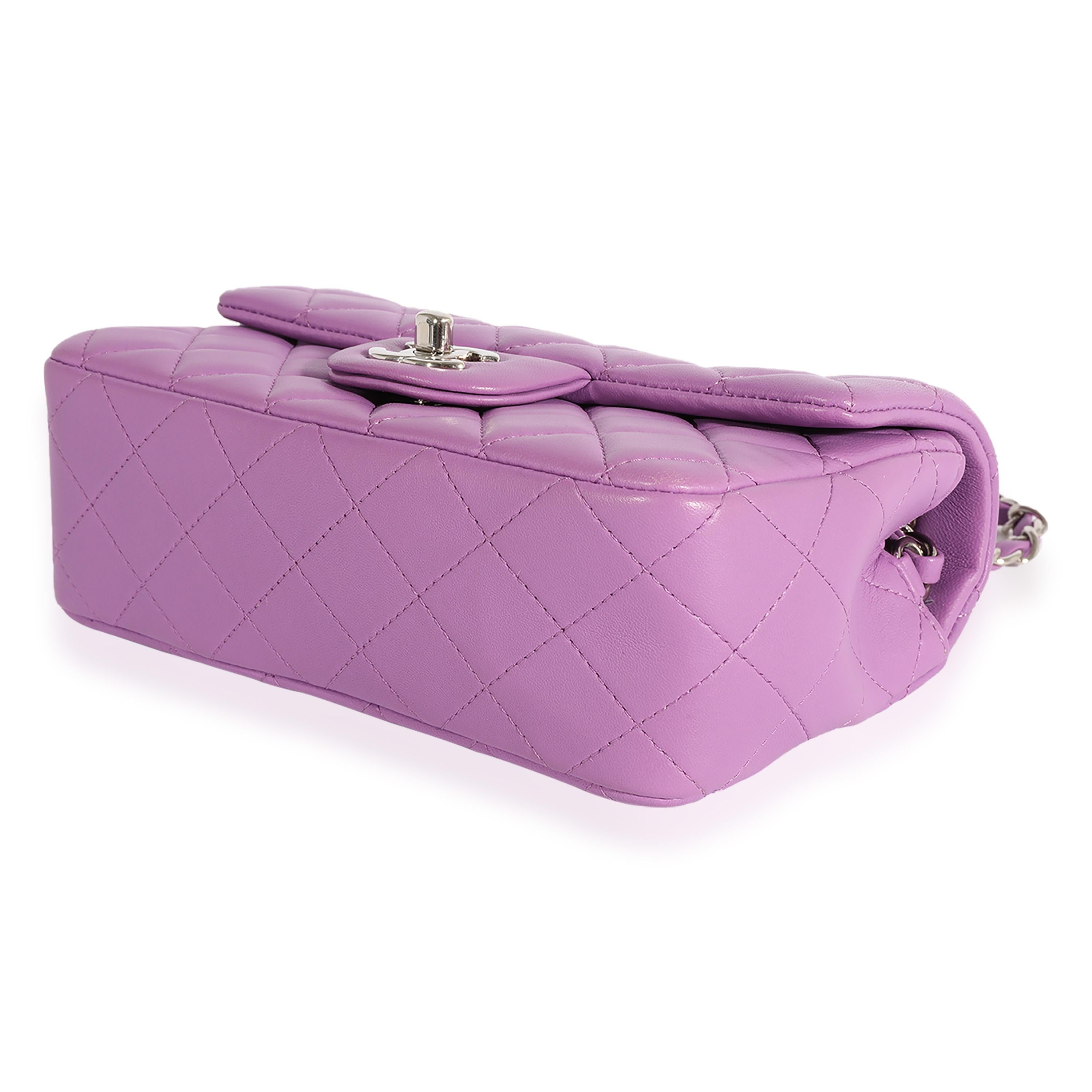 Listing Title: Chanel Purple Quilted Lambskin Mini Rectangular Classic Flap Bag
SKU: 123923
Condition: Pre-owned 
Handbag Condition: Excellent
Condition Comments: Excellent Condition. Scratching to hardware. Tiny scuff at underflap. No other visible