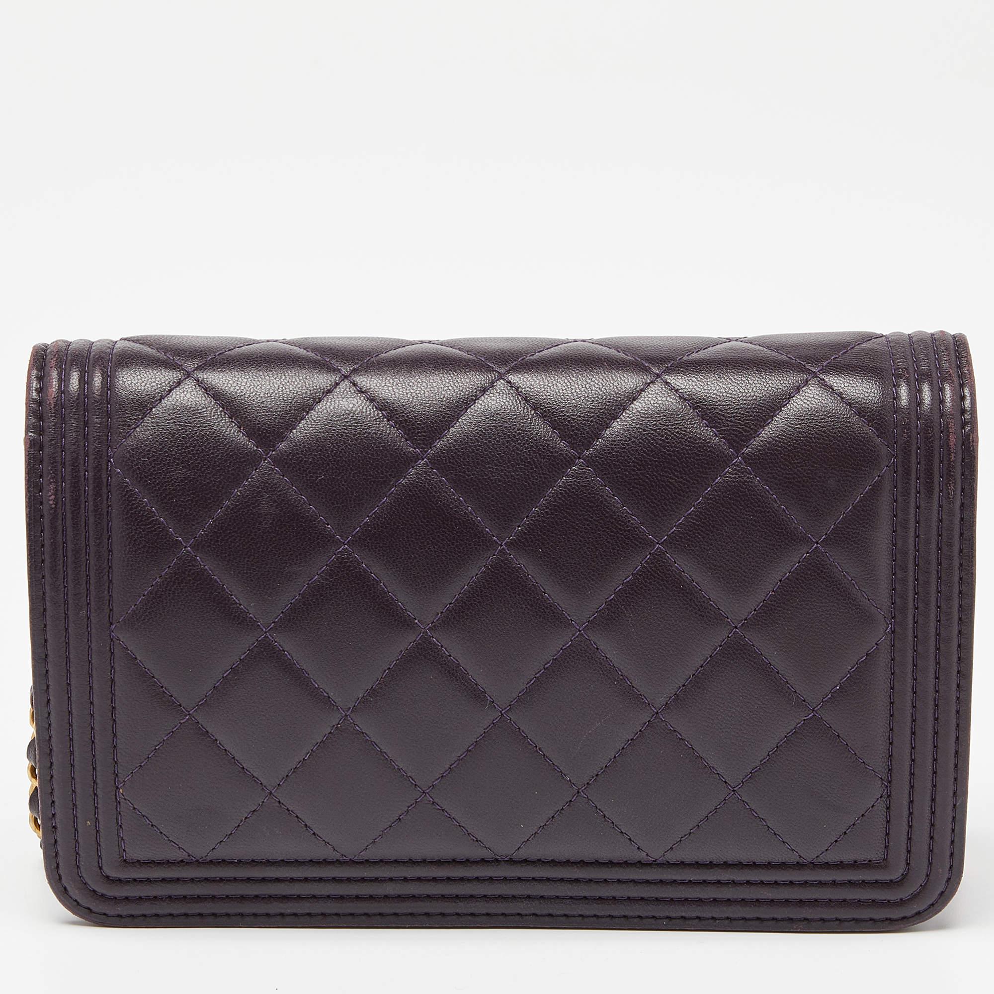 Classy and super stylish, this WOC bag is a creation by Chanel. It has been wonderfully crafted from purple-hued leather and enhanced with the signature quilt. The insides are lined with leather & fabric and sized to carry your necessities. The bag