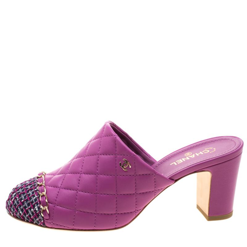 How can one not be smitten by these stunning mules by Chanel! In a magical blend of luxury and high-fashion, the mules come crafted from purple quilted leather. They are designed with tweed fabric cap toes and signature chain detailing on the vamps