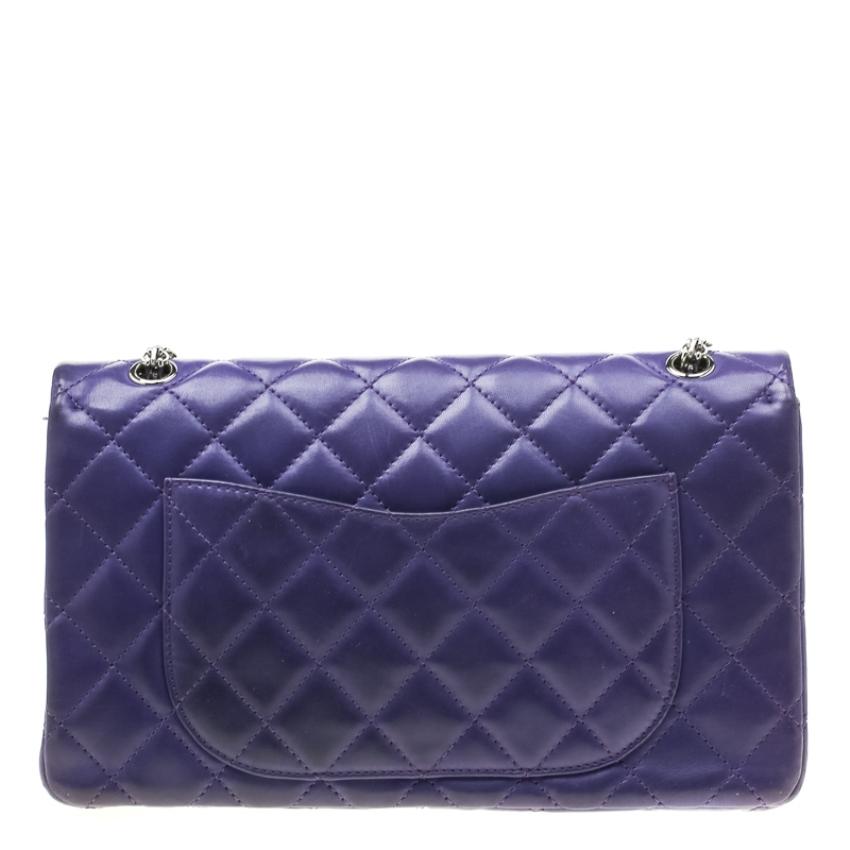 This Reissue 2.55 Classic 227 is a buy that is worth every bit of your splurge. Exquisitely crafted from purple leather, it bears their signature quilt pattern and the iconic Mademoiselle silver-tone lock. The flap secures fine leather-lined