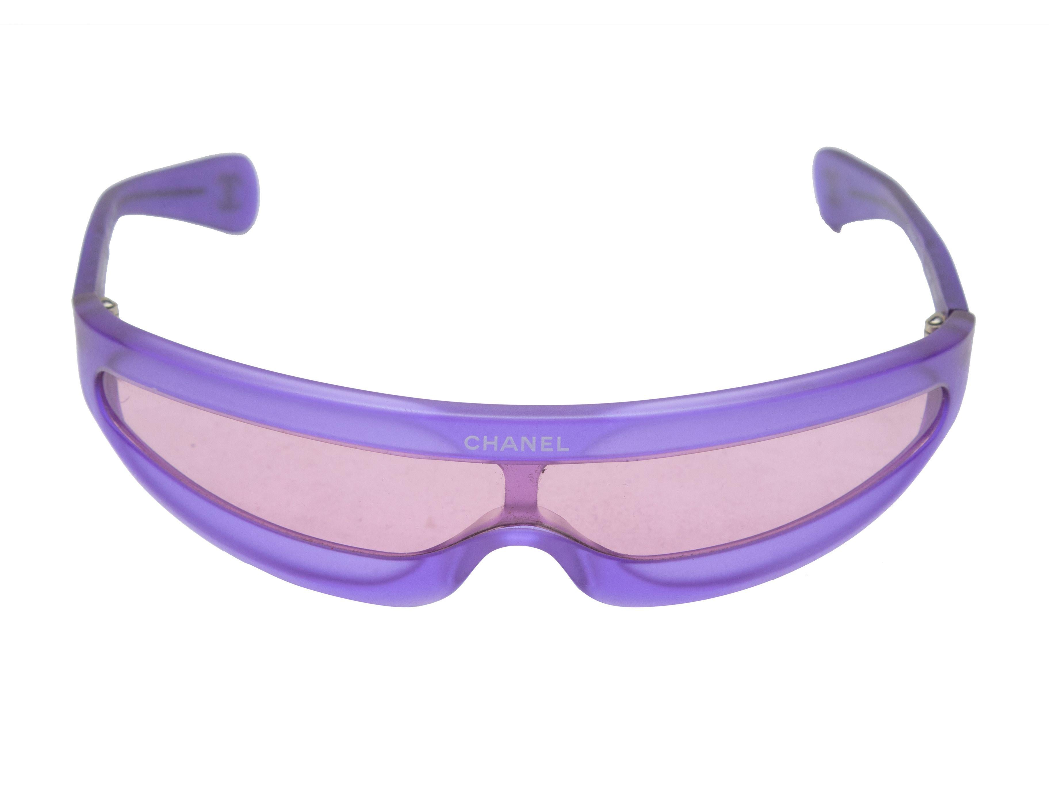 Product Details: purple acetate thin shield sunglasses by Chanel. From the Spring/Summer 2001 Collection. Purple tinted lenses. 1.75