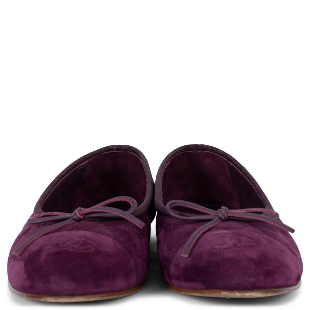100% authentic Chanel CC quilted classic flats in purple suede with grosgrain trim. Have been worn and are in excellent condition. 

Measurements
Model	REV G26250
Imprinted Size	38.5
Shoe Size	38
Inside Sole	24.5cm (9.6in)
Width	8cm