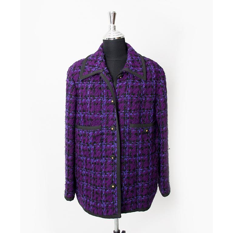 Chanel Purple Wool Skirt Suit Tailleur is an iconic vintage piece, a must in your closet! It's made of wool, the linen is silk. Comes with extra fabric and buttons.