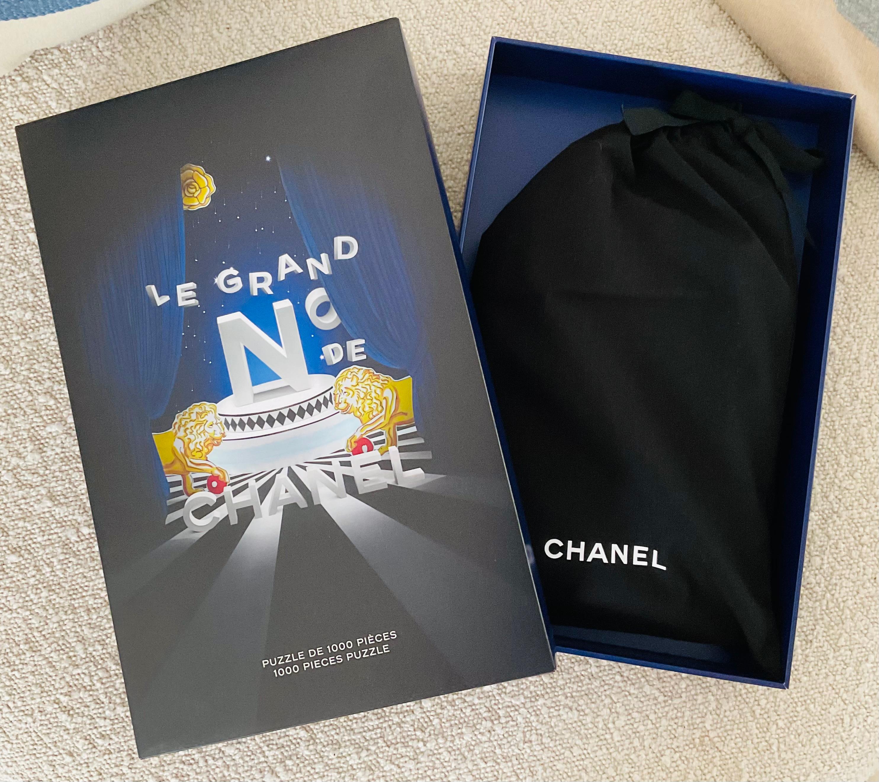 A must-have for Chanel collectors. These puzzles are extremely rare and no longer available for purchase, making them highly sought-after by collectors worldwide. Step into the world of Le Grand Numéro de Chanel, the dazzling Parisian exhibition