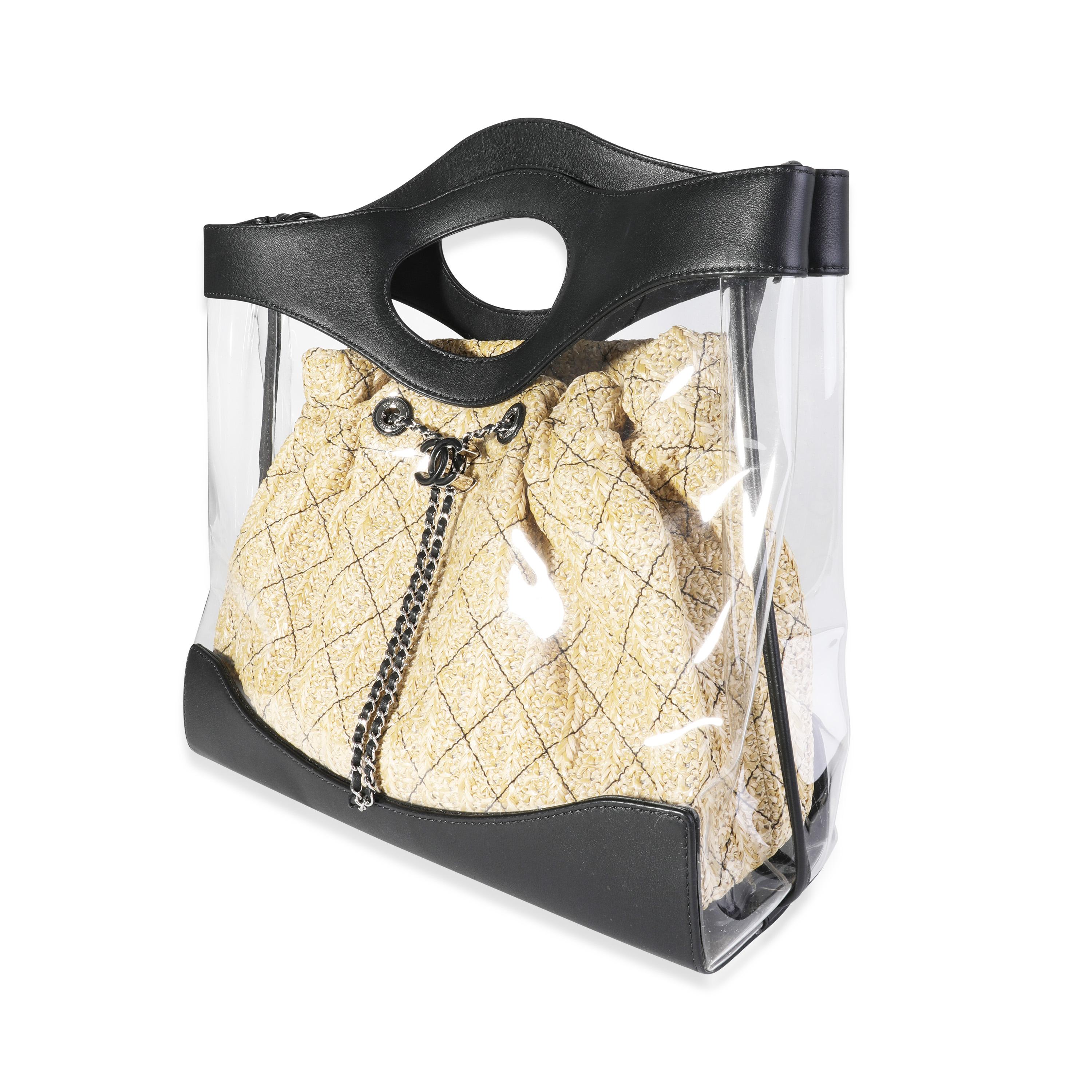 Listing Title: Chanel PVC & Black Calfskin Raffia Chanel 31 Shopping Tote
SKU: 117668
MSRP: 4400.00
Condition: Pre-owned (3000)
Handbag Condition: Very Good
Condition Comments: Very Good Condition. Plastic on some hardware. Scuffing to corners and