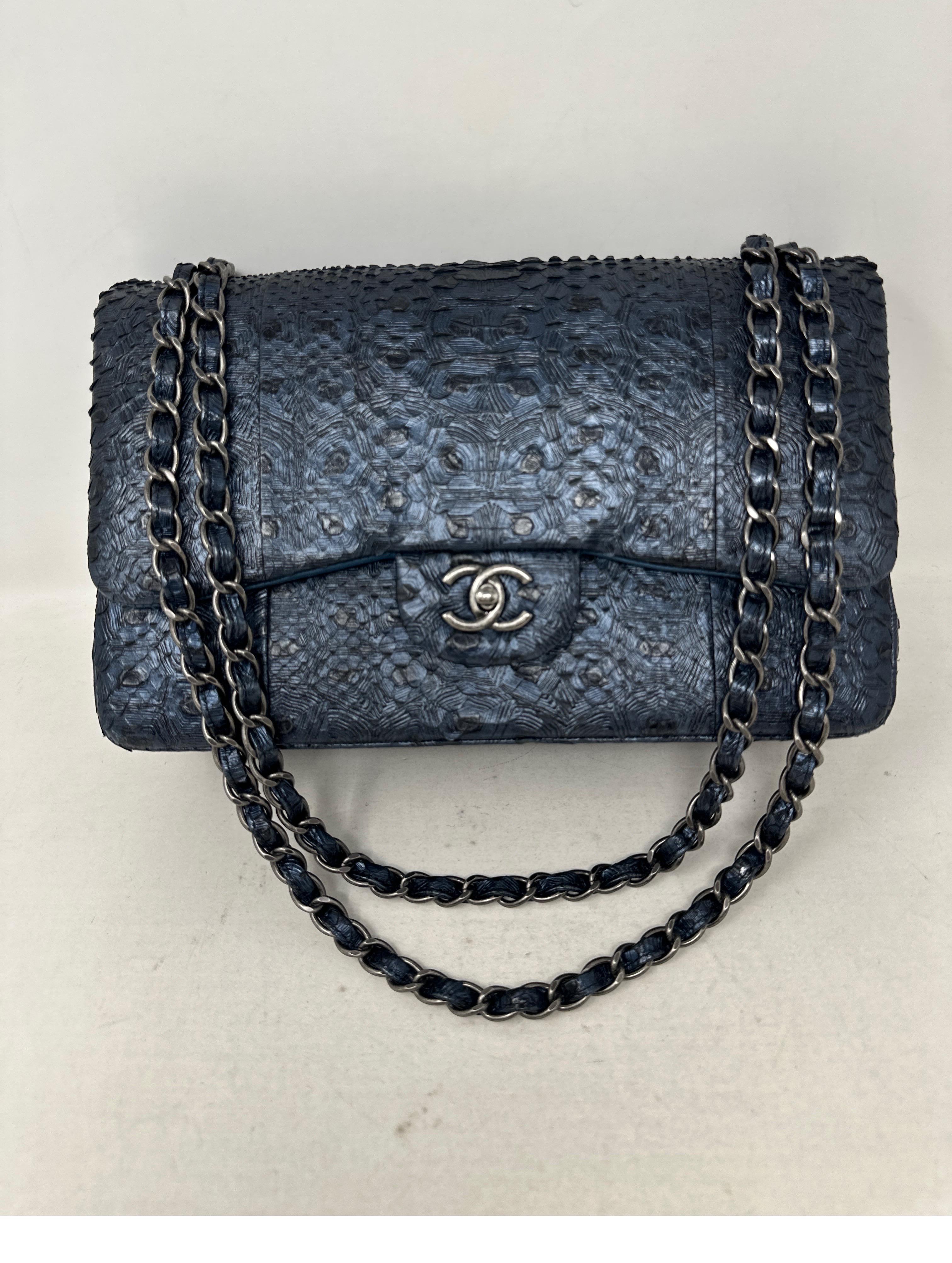 Chanel Exotic Python Jumbo Double Flap Bag. Extremely rare exotic skin leather bag. Chanel has retired exotics. Great investment bag. Value has gone way up due to rarity and Chanel keeps going up. Immaculate condition. Bag was never used. Full set.