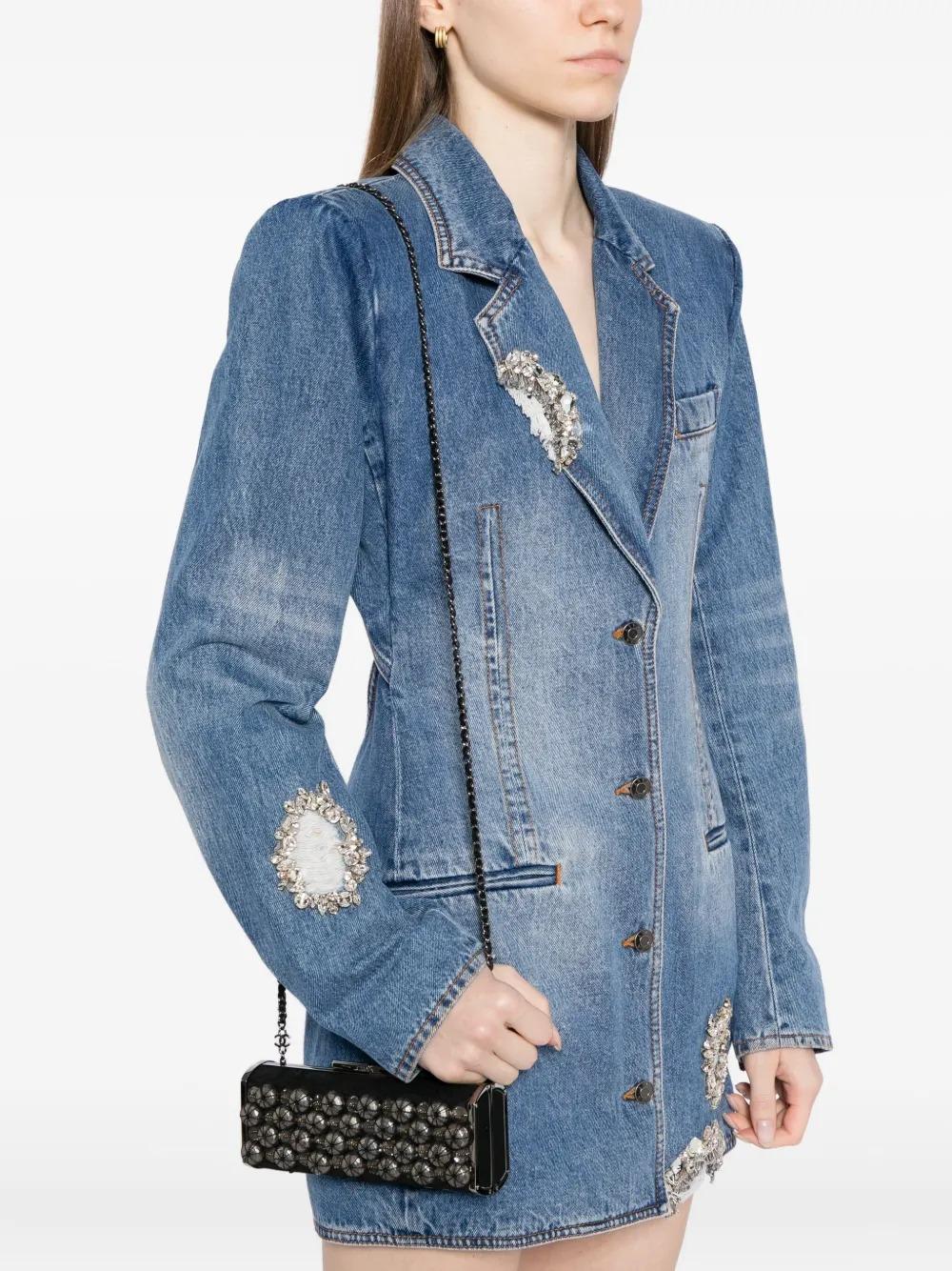 circa 2006-2008
black
top clip fastening
chain-link shoulder strap
logo print to the top
main compartment

Made in Italy