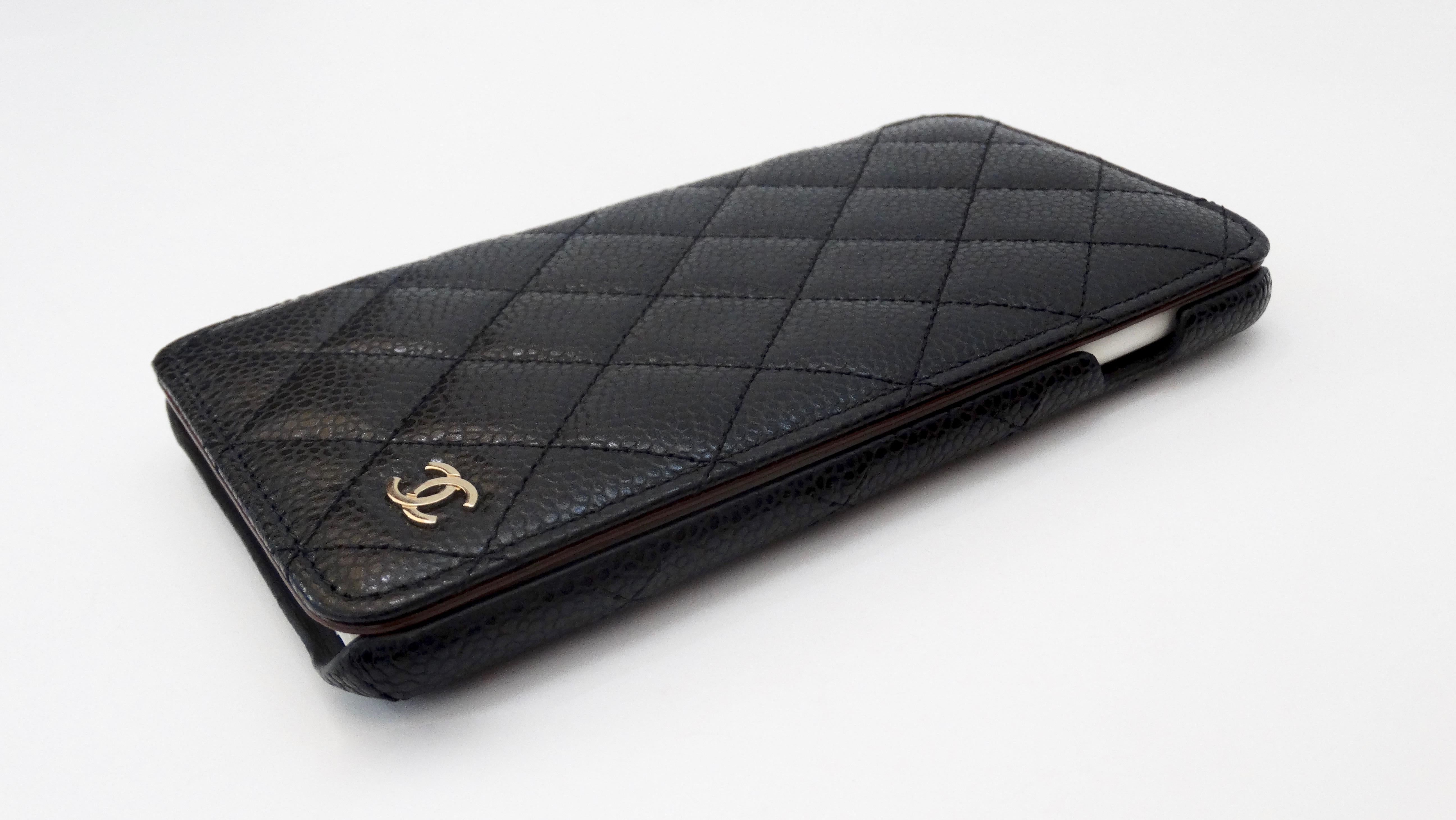 Accessorize your phone with this adorable Chanel iphone plus case! Circa recent 2000s, this iphone 7 or 8 plus case is crafted from durable black caviar quilted leather and features the signature quilted stitching. Includes a silver toned CC in the