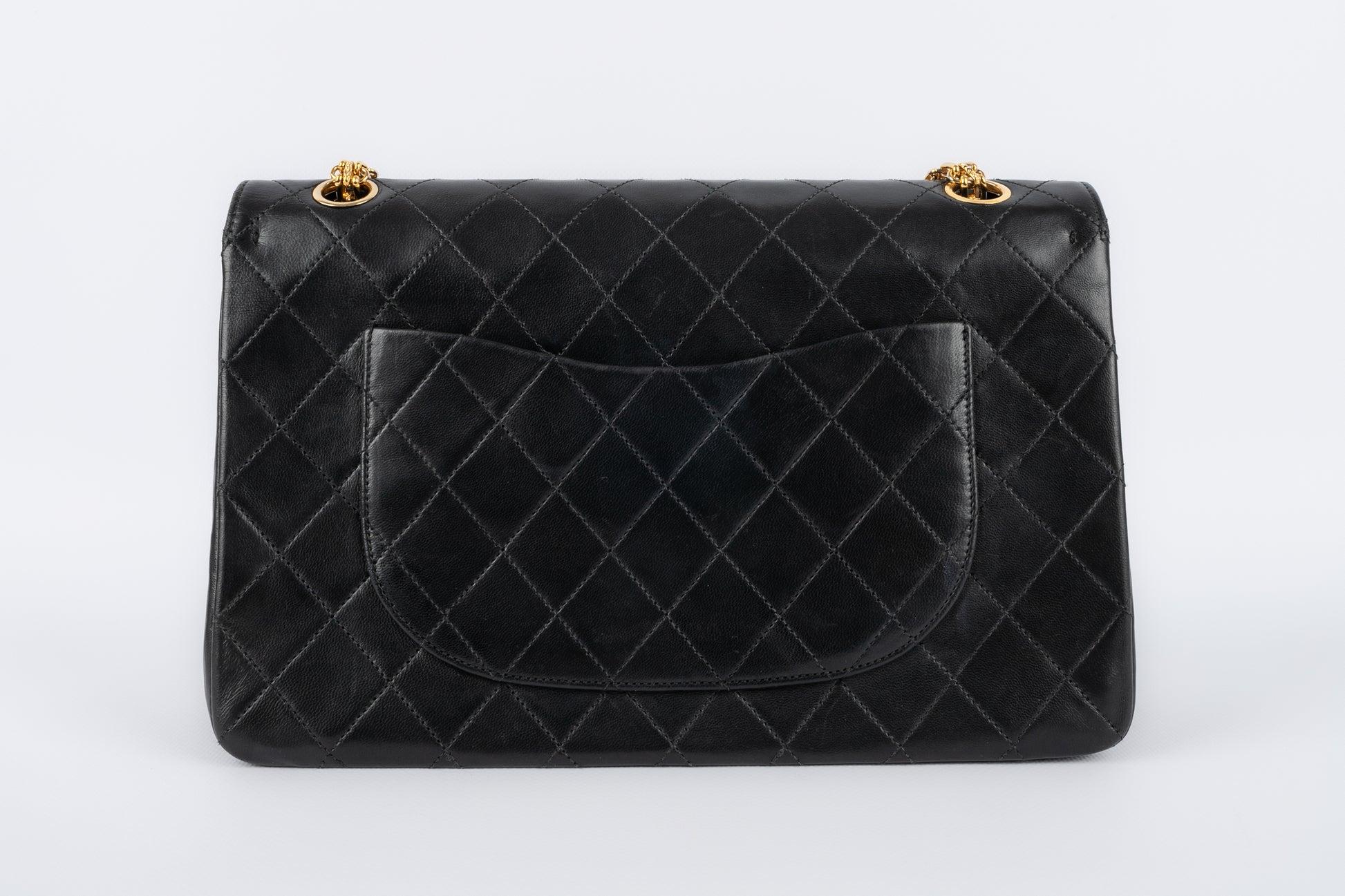 Noir Sac Timeless en cuir d'agneau noir matelassé de Chanel, 1997/1999 en vente
