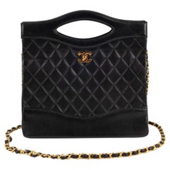 Chanel Quilted Black Leather Bag with Red Leather Inside, 1989/1991