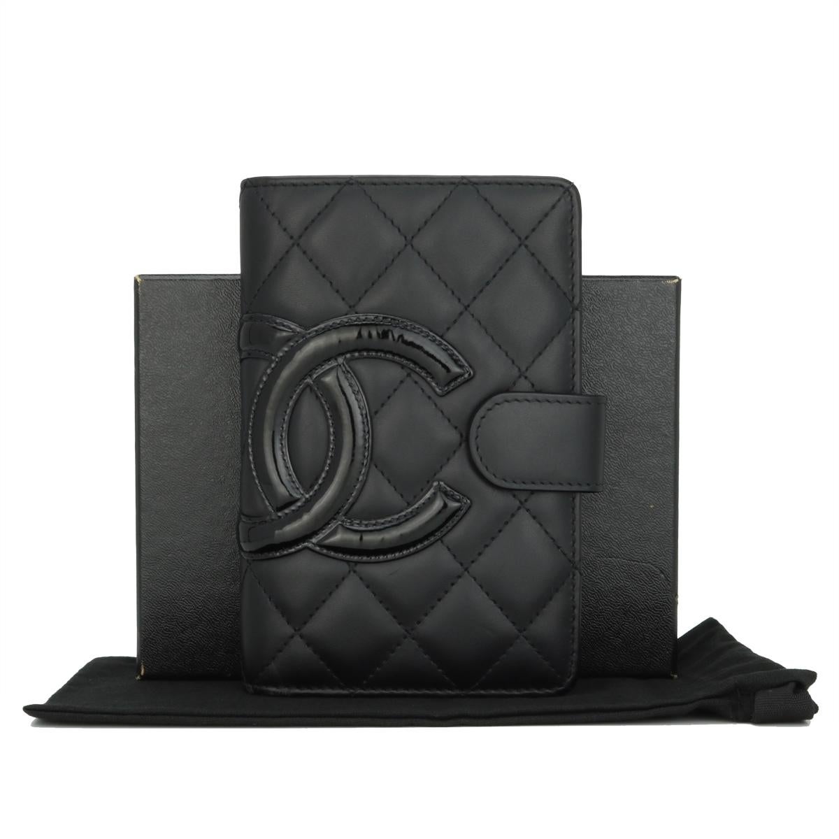 Chanel Quilted Cambon Bifold Medium Zipped Pocket Wallet Black Calfskin with Silver Hardware 2014.

This stunning Cambon wallet is in good condition, the wallet still holds its original shape, and the hardware is still very shiny.

- Exterior