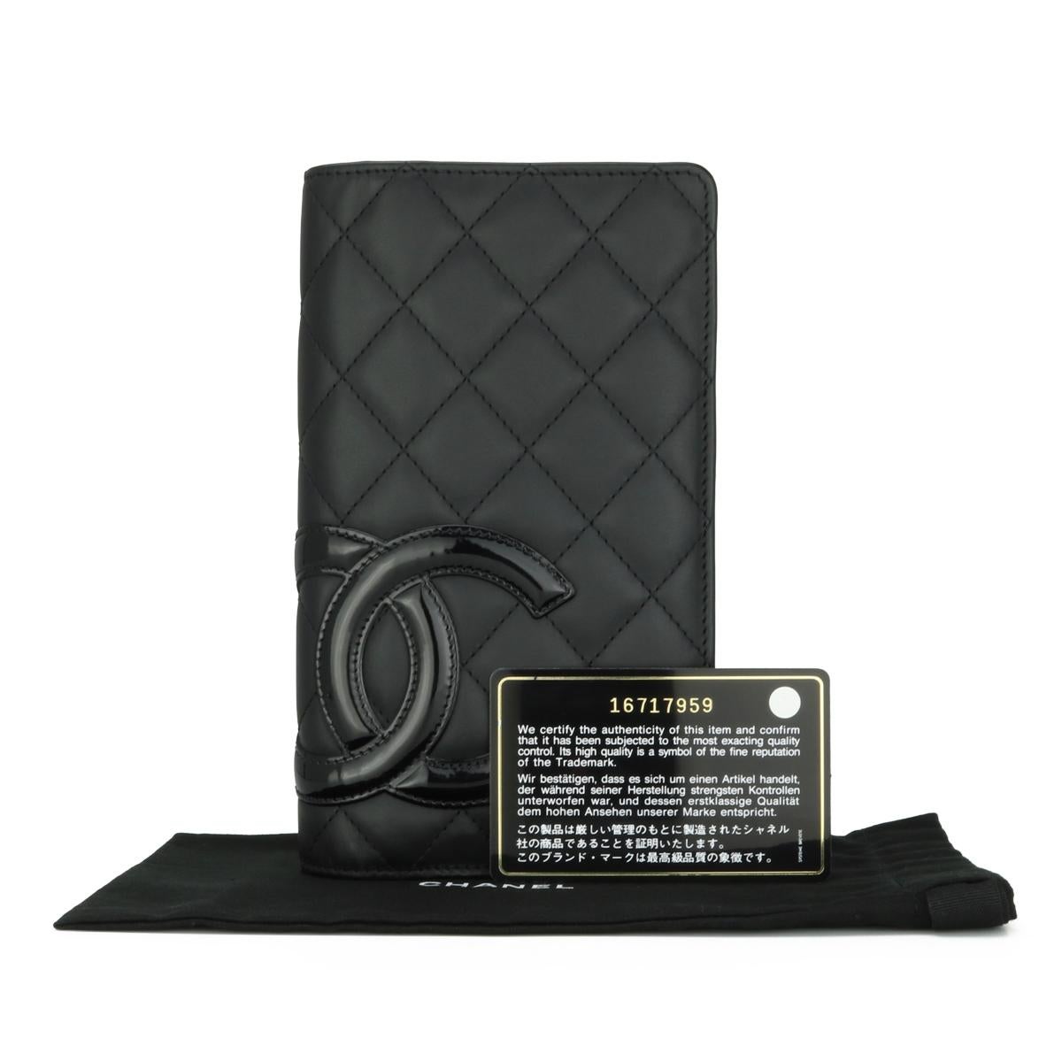 Chanel Quilted Cambon Long Flap Wallet Black Calfskin with Silver Hardware 2012.

This stunning Cambon wallet is in very good condition, the wallet still holds its original shape, and the hardware is still very shiny.

- Exterior Condition: Very