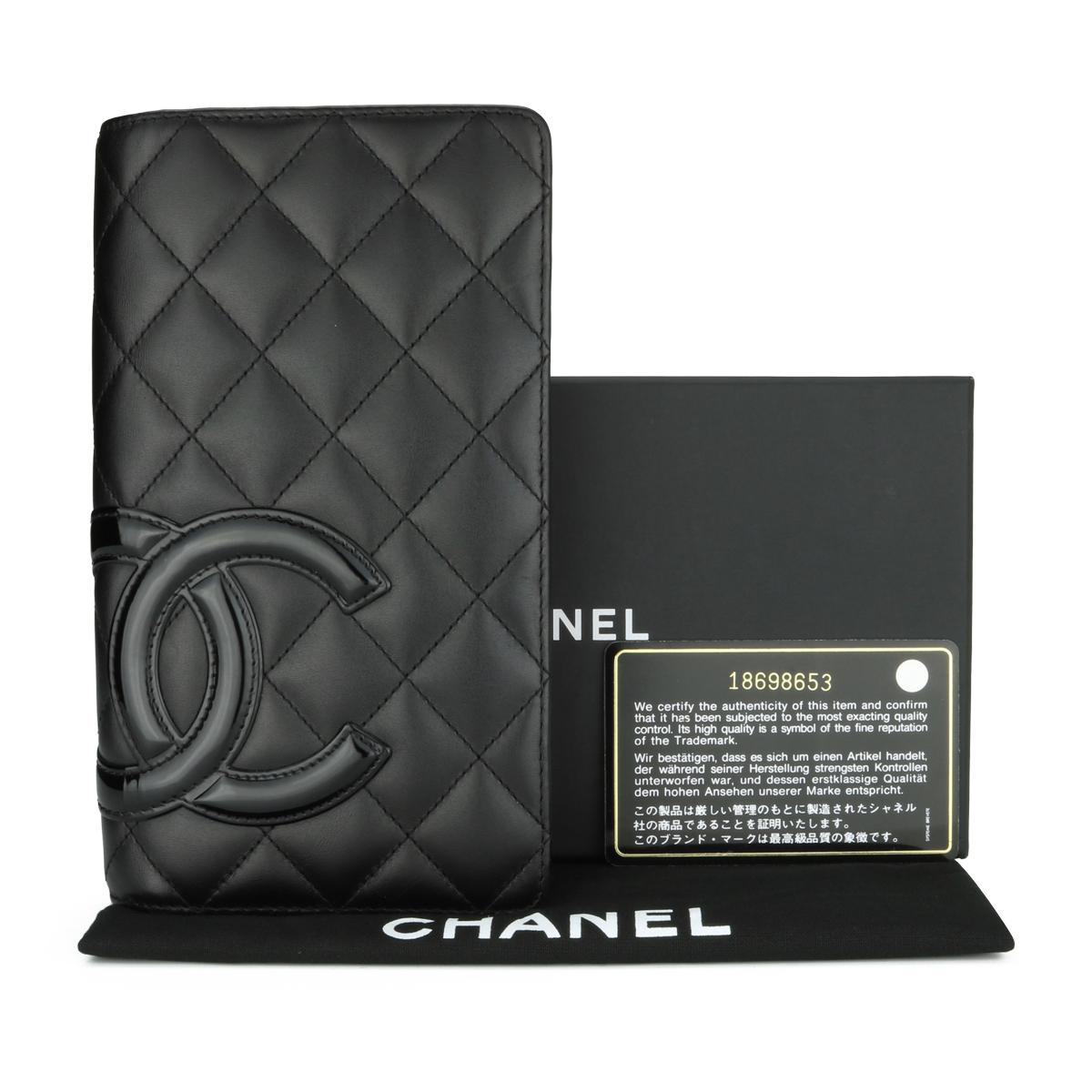 Chanel Quilted Cambon Long Flap Wallet Black Calfskin with Silver Hardware 2014.

This stunning Cambon wallet is in very good condition, the wallet still holds its original shape, and the hardware is still very shiny.

- Exterior Condition: Very