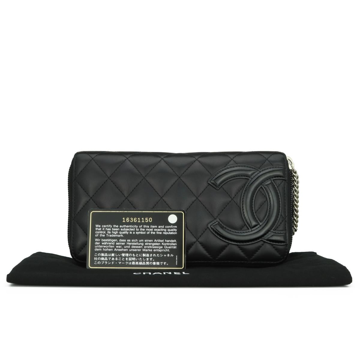 CHANEL Quilted Cambon Long Zipped Wallet Black Calfskin with Silver-Tone Hardware 2012.

This stunning large zipped wallet is in good condition. It still holds its original shape, and the hardware is still very shiny. It is such a gorgeous,