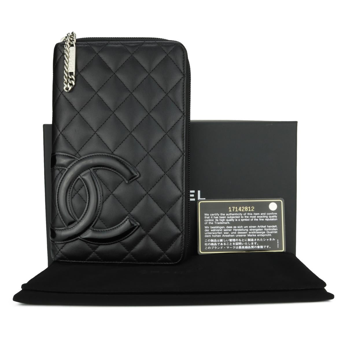 CHANEL Quilted Cambon Long Zipped Wallet Black Calfskin with Silver Hardware 2013.

This stunning zip wallet is in very good condition, the wallet still holds its original shape, and the hardware is still very shiny. Such a gorgeous, functional long