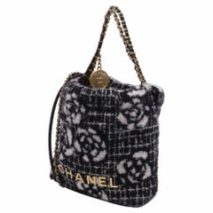 Chanel Quilted Camellia Chanel 22 Bag in Black Cashmere