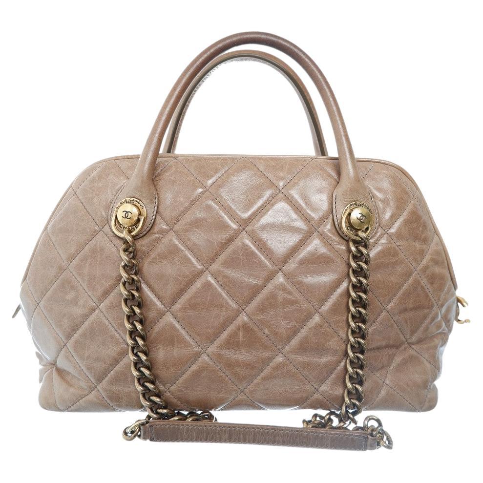 Chanel Quilted Castle Rock Brown Bowler Bag