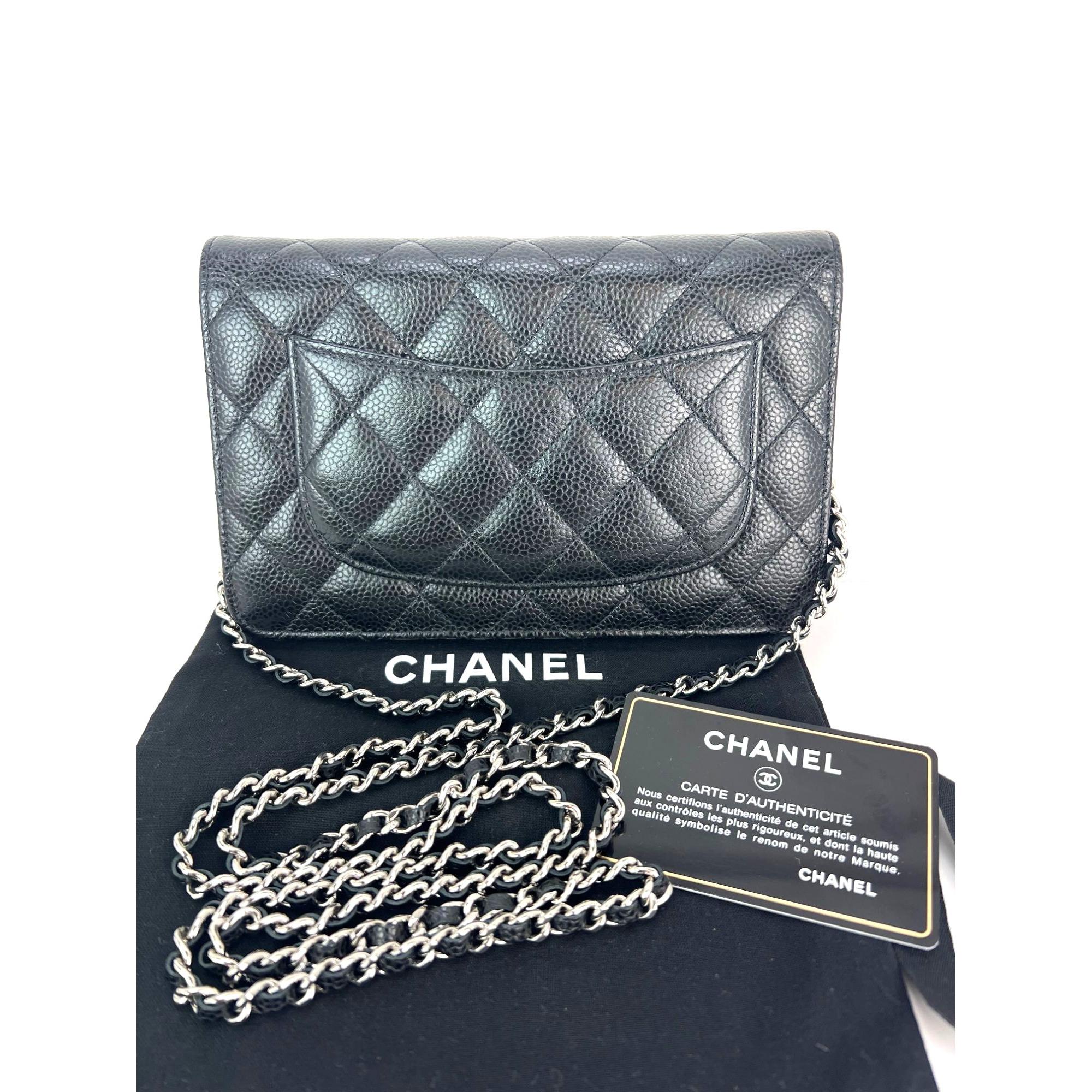 Pre-Owned  100% Authentic
Chanel Quilted Caviar Calfskin Wallet on a Chain Clutch 
Wallet on a Chain or Clutch
A I Phone Max fits in bag easily. 
RATING: A...excellent, near mint, has little to no signs of wear
MATERIAL: calfskin