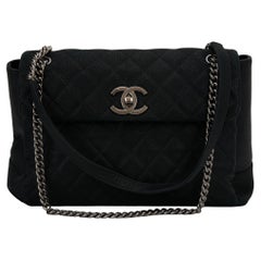 Chanel Quilted Caviar Lady Pearly Flap