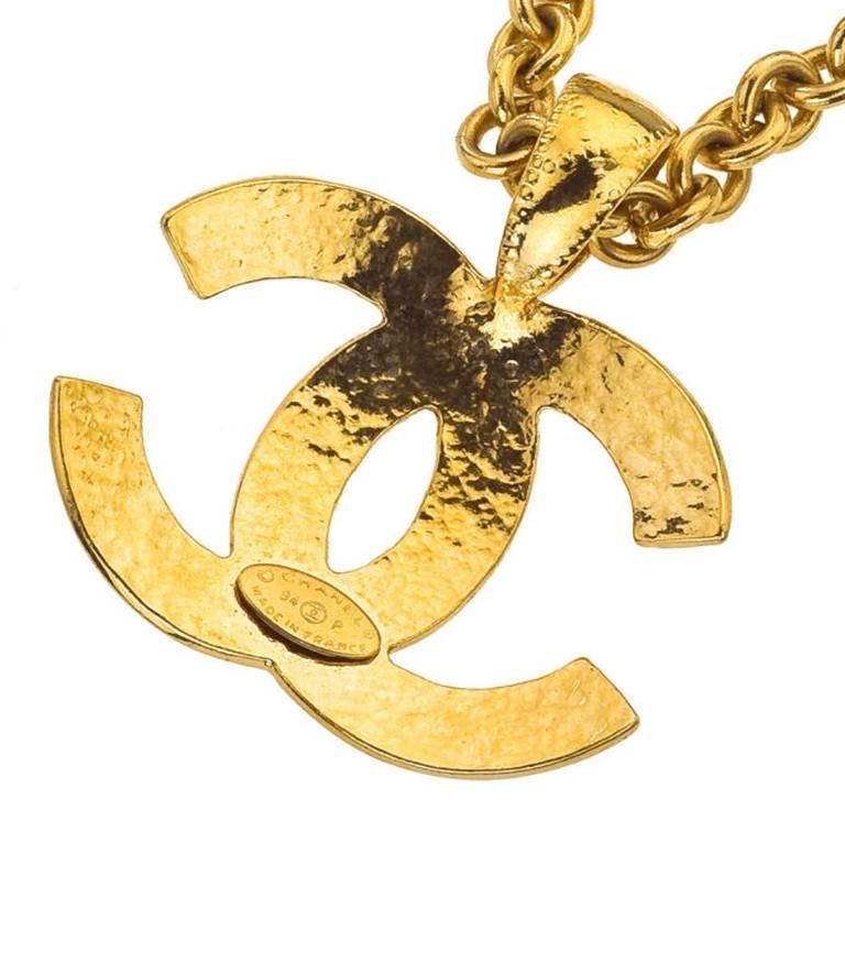 Chanel CC necklace with quilted details. CC charm 1.6 by 2.2 inches, chain length 30 inches.