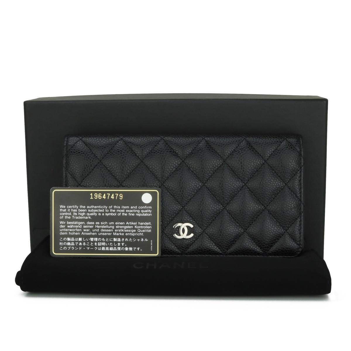 Chanel Quilted Classic Long Flap Yen Wallet in Black Caviar with Silver Hardware 2014.

This stunning wallet is in very good condition, the wallet still holds its original shape, and the hardware is still very shiny.

- Exterior Condition: Very good