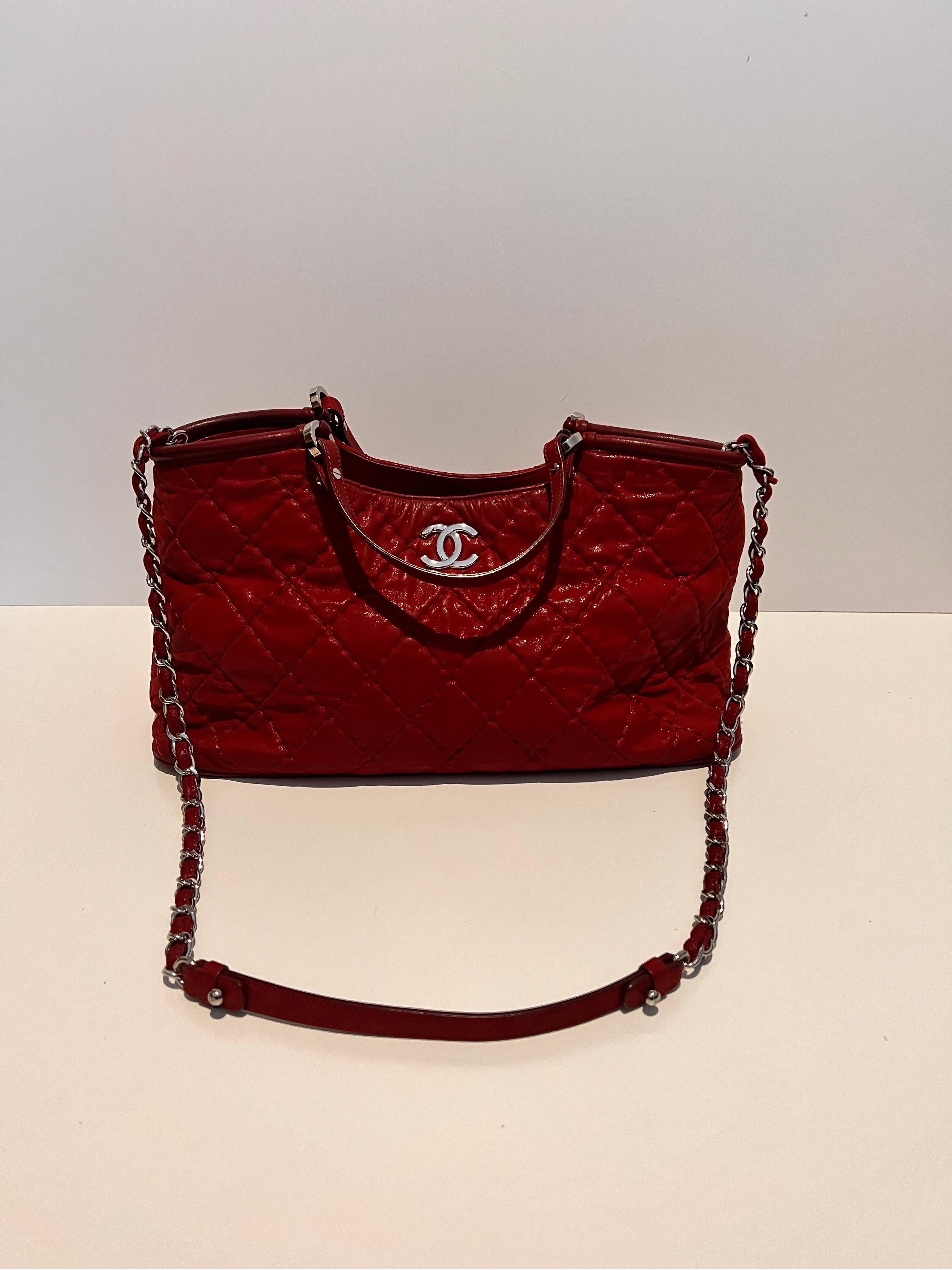 Stunning and sexy bright red Chanel tote, top handle hand bag. 
Beautiful with some signs of wear. See images.
A truly unique and classic item. 