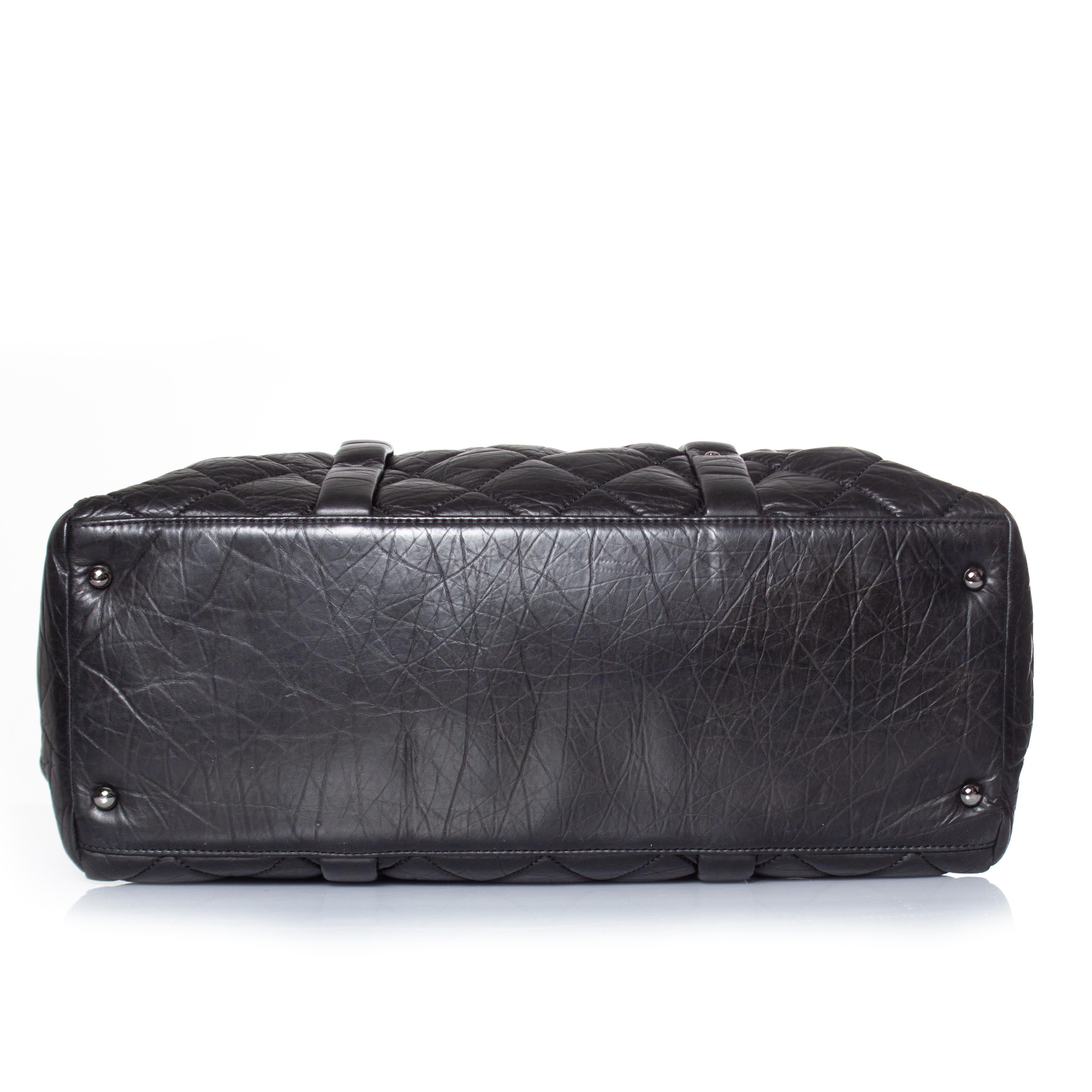 Chanel, distressed lambskin quilted lady braid flap tote in black. The item is in very good condition on the exterior and interior. Comes with serial sticker inside the bag. Leather tab on the zipper is missing.

• CONDITION: very good condition 

•