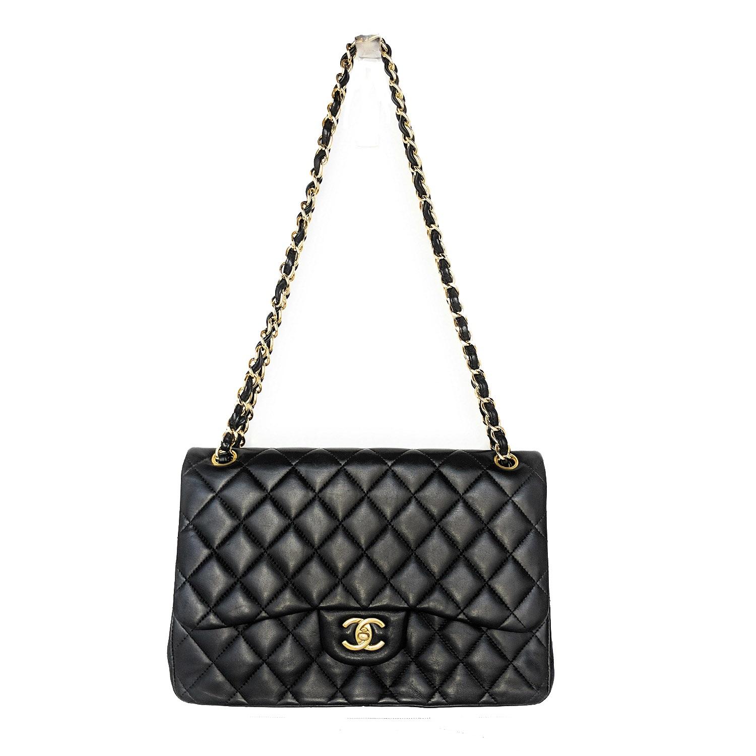 This lovely shoulder bag is crafted of soft and supple diamond-quilted lambskin leather in black. The bag features a leather-threaded polished gold-tone chain-link shoulder strap, a rear patch pocket, and a matching gold classic CC turn-lock on the