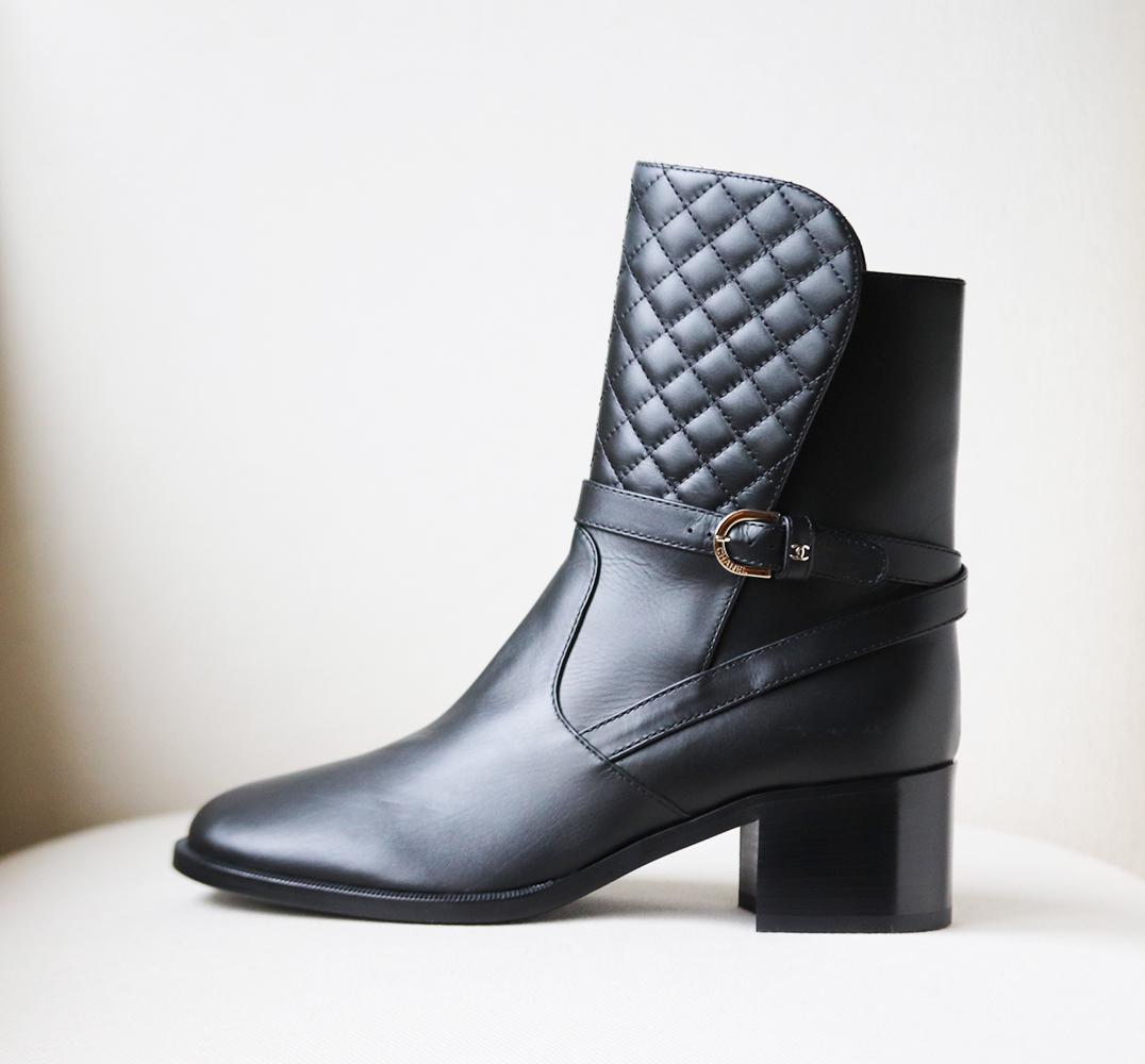 These beautiful Chanel boots are made from soft quilted lambskin leather, they are adorned with a logo embellished silver-tone buckle detail at the side and finished with a slight heel.
Heel measures approximately 50mm/ 2 inches.
Black