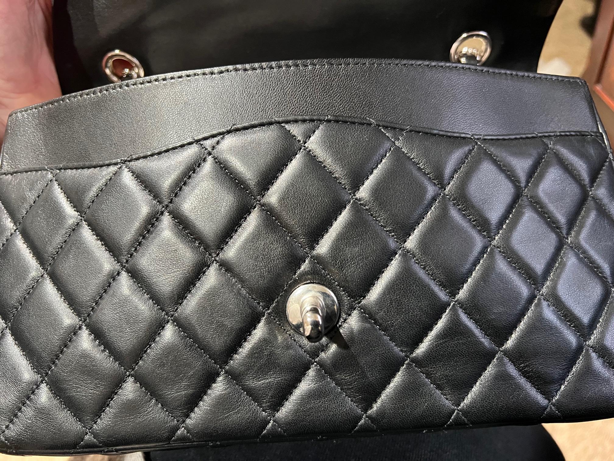 Pre-Owned  100% Authentic
Chanel Quilted Lambskin Valentine Crystal Charms Medium Single Flap Black Bag
This Stunning Chanel Hosts 5 crystal charms, dare take 1 or 2 off and use on a necklace
(they would need to be cut off). They really are gorgeous