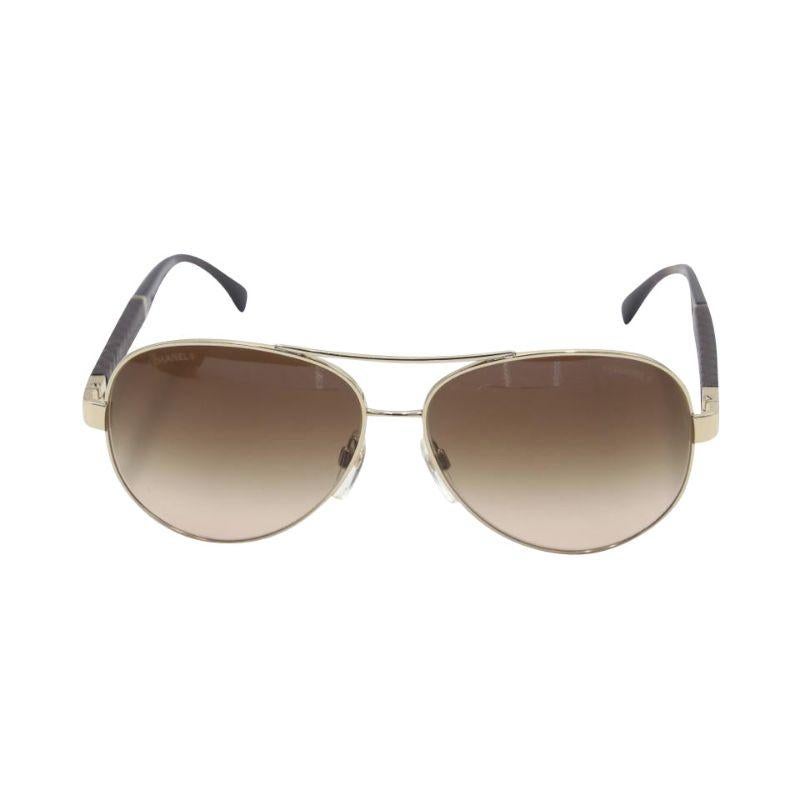 Chanel Quilted Leather Aviator Cc Sunglasses 4195Q

Stay cool with these trendy and cutting edge Chanel aviator sunglasses! The tinted lenses ensure superb optical clarity and 100% UV protection while maintaining a sense of style. Quilted leather