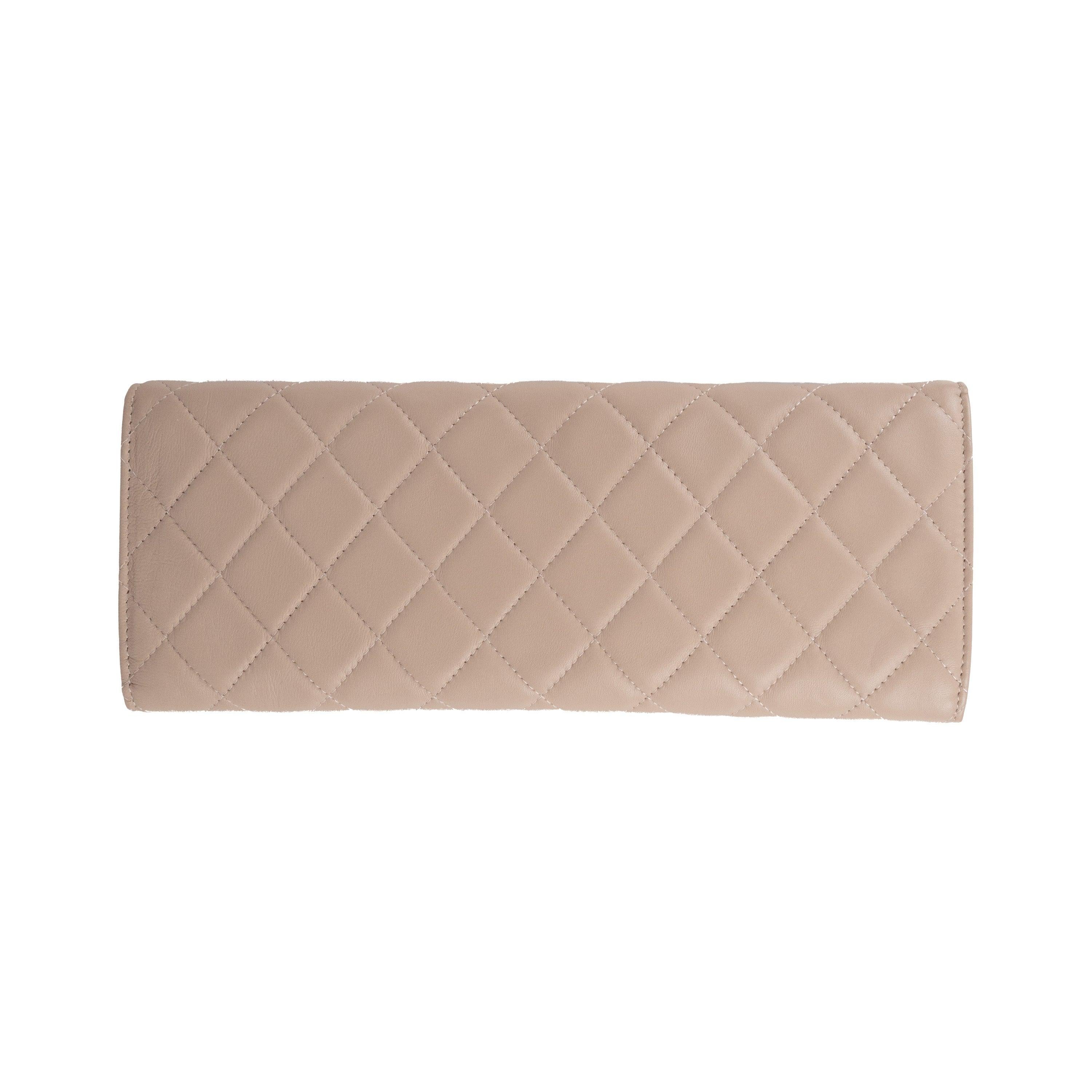Expertly crafted from soft and delicate lambskin, the Chanel Quilted Leather Jewelry Pouch is the ultimate accessory for any jewelry lover. The light soft pink color exudes elegance, while the snap button closure ensures secure storage. Multiple
