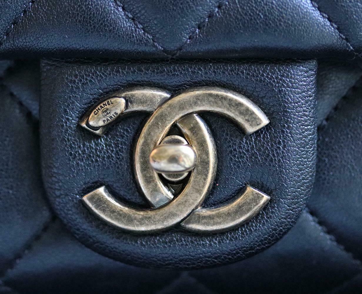 Chanel Quilted Leather Large Trapezio Flap Bag 3