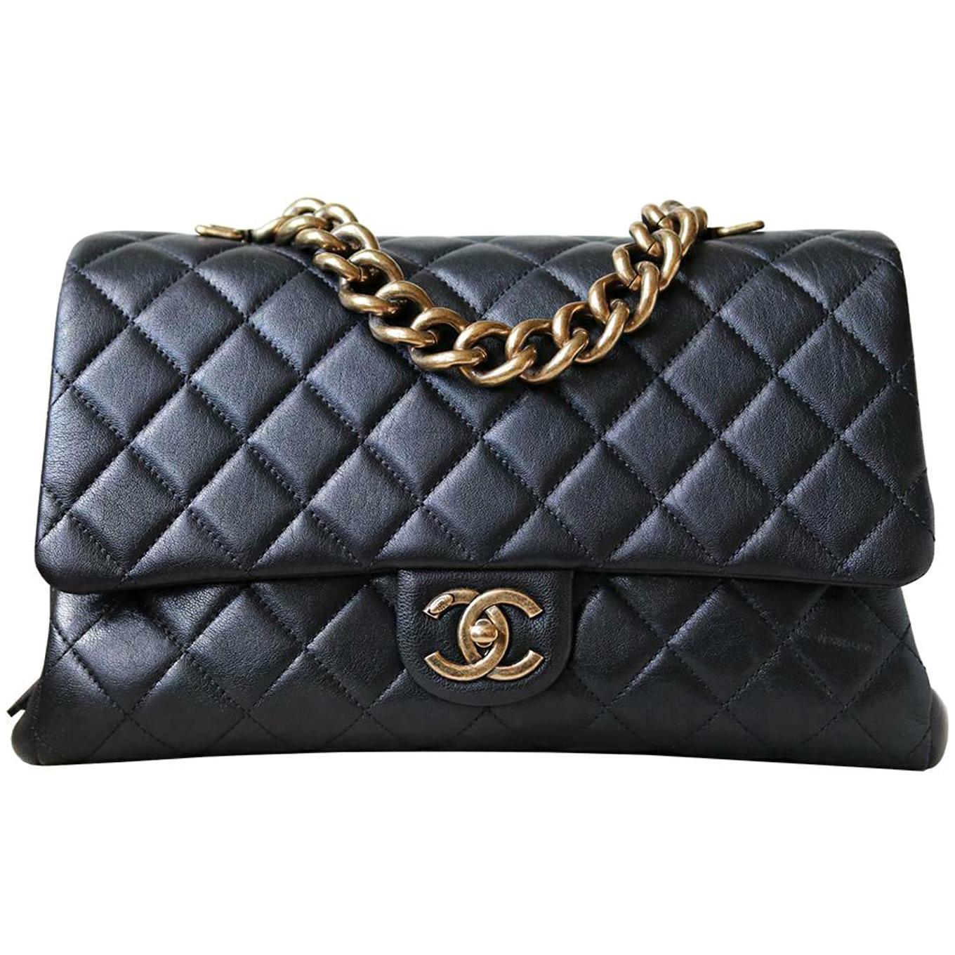Chanel Quilted Leather Large Trapezio Flap Bag