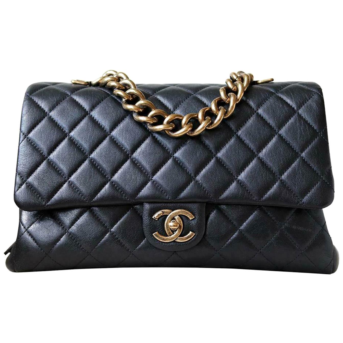 Chanel Quilted Leather Large Trapezio Flap Bag