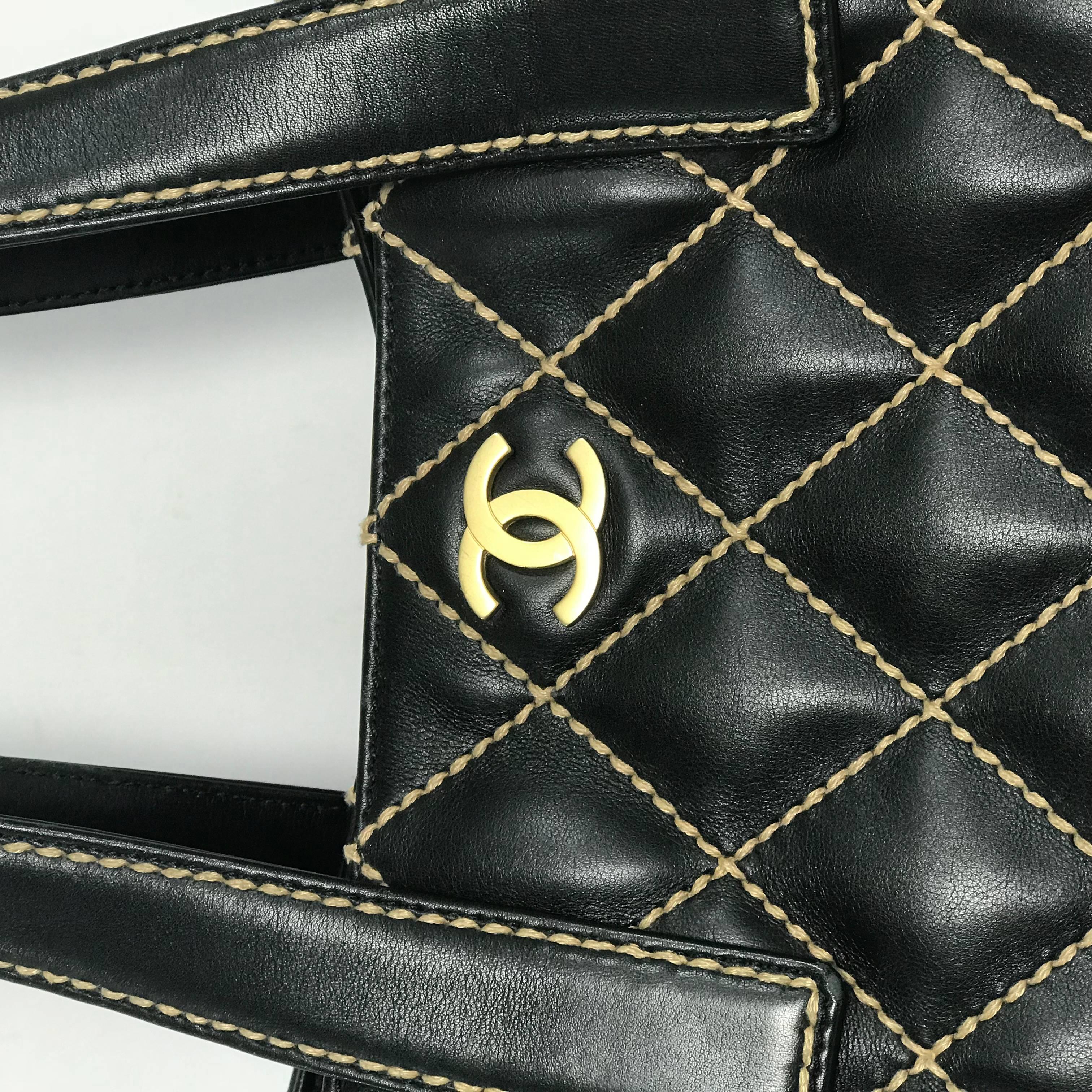 MODEL - Chanel Quilted Leather Wild Stitch Tote in Black

CONDITION - Looks almost New! No visible signs of wear.

SKU - 1894

ORIGINAL RETAIL PRICE - 3250

DATE/SERIAL CODE - 2069810

ORIGIN - France

PRODUCTION - 1991 to 1994

DIMENSIONS - L16 x