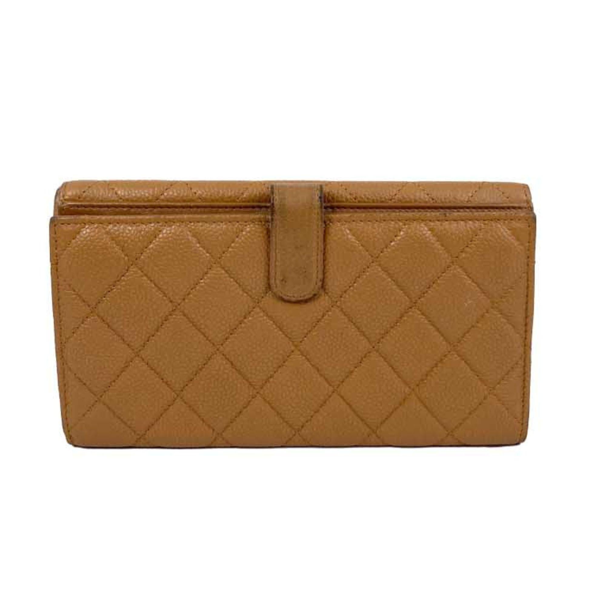 Chanel light brown quilted leather wallet. 
Serial Number: 15851553

Material: Leather
Height: 11cm
Width: 19cm
Depth: 1.5cm
Overall condition: Great
Interior condition: Signs of use
External condition: Leather scuffing and discoloration

