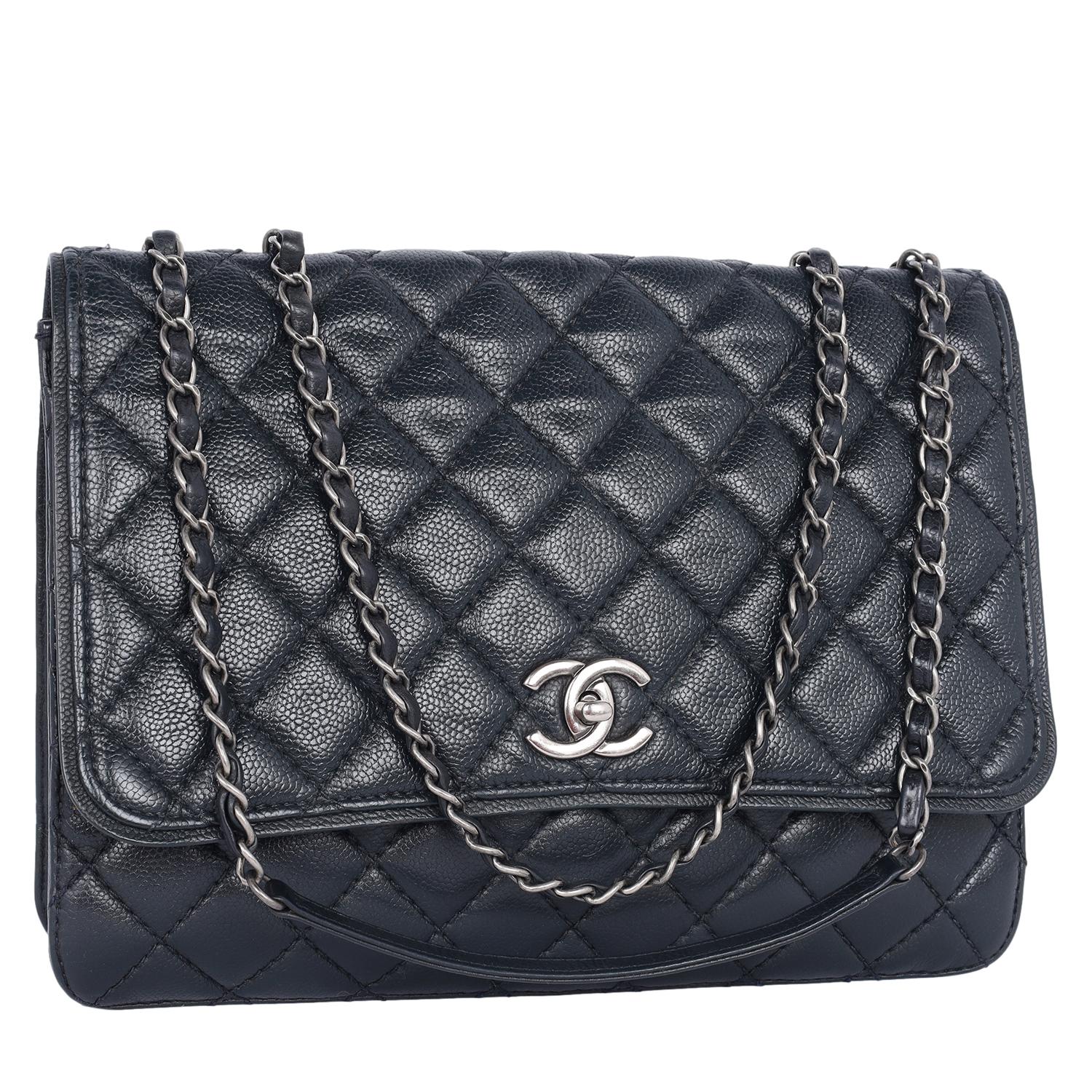 Authentic, pre-loved Chanel quilted Matelasse CC Logo Caviar shoulder bag in black. Features black quilted caviar leather, this luxurious, runway-ready bag features a woven-in leather chain strap and antique silver-tone hardware accents. Its CC