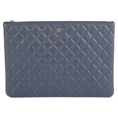 Chanel Quilted O-Case Clutch Navy