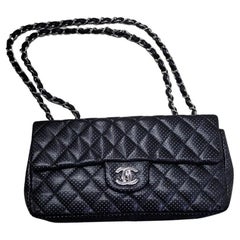 Chanel Black Lambskin Vintage Timeless Shoulder Bag at 1stDibs