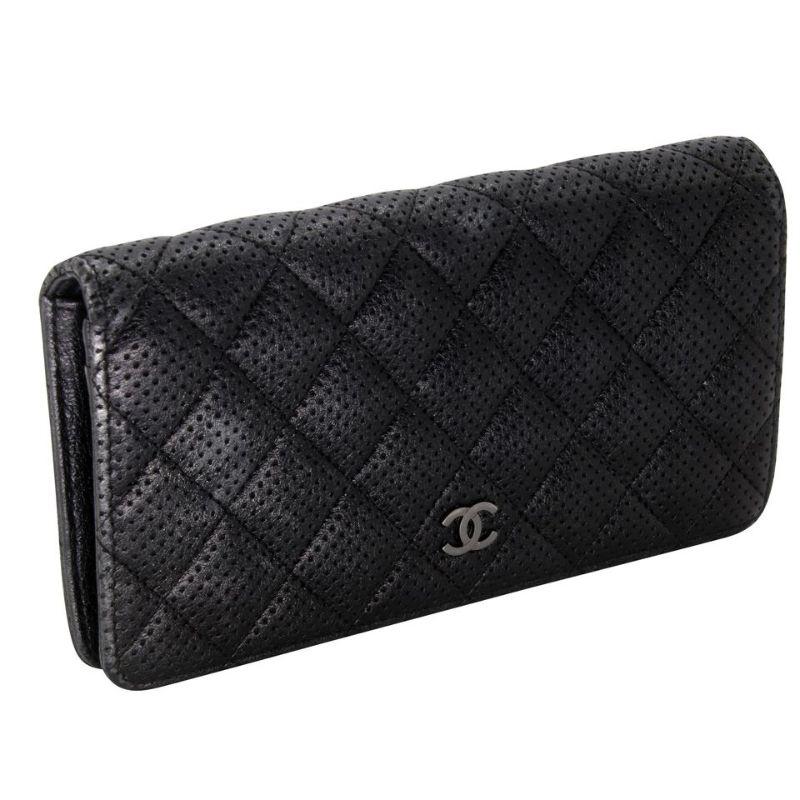 Chanel Quilted Perforated L Lambskin Leather Yen Wallet CC-0213N-0024

This Chanel Quilted Lambskin Leather L Yen Wallet is perfect if you are seeking something chic and luxurious to organize your essentials such as bills, credit cards and coins. It