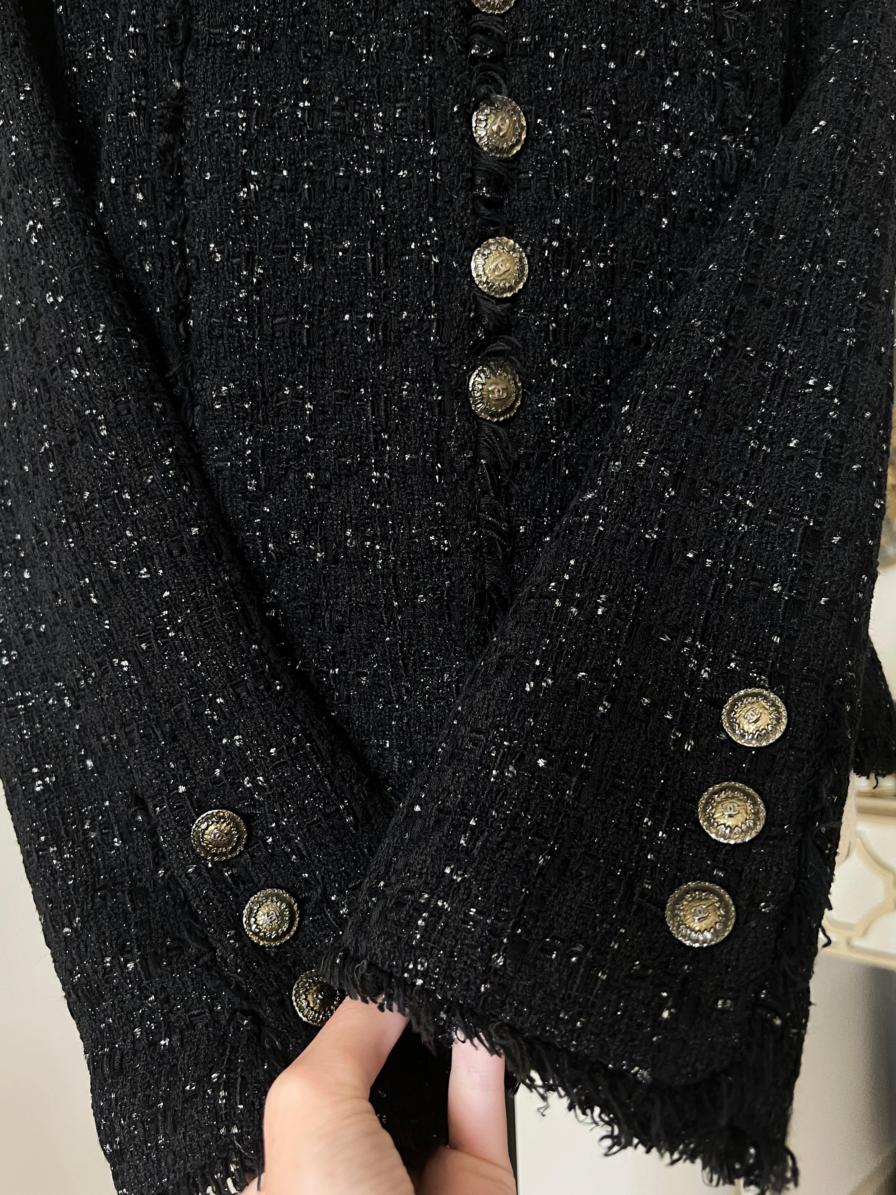 Super rare Chanel black iridescent  tweed jacket with signature diamond quilt details.
 Impossible to find anywhere!
 Retail price was over 8,800€. 
- CC logo gold-tone buttons at front and at cuffs. 
Size mark 44 fr. Condition is pristine.