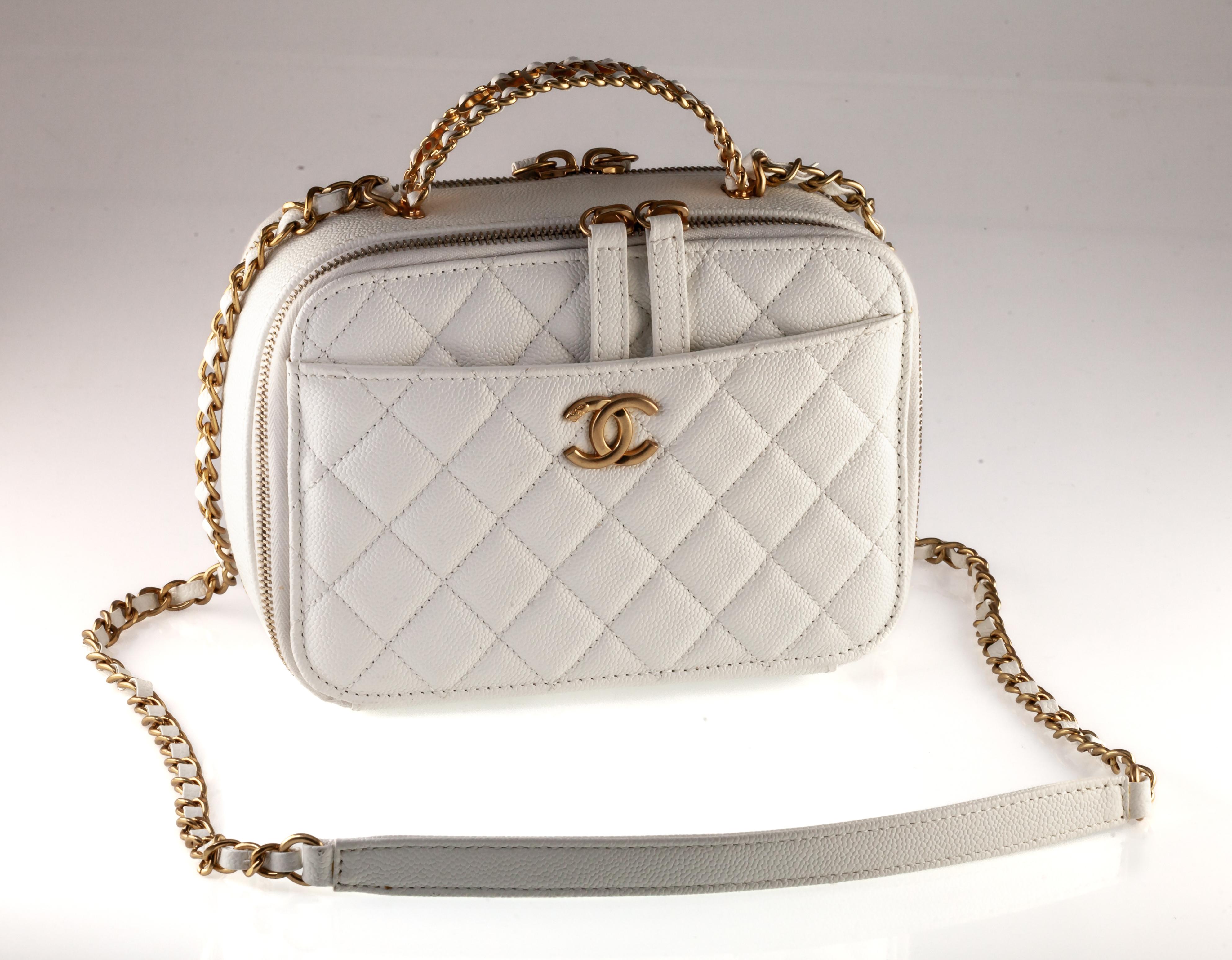 Gorgeous Chanel Caviar Leather Quilted Vanity Case
Features Gold Hardware and White Leather
Appx Width = 8
