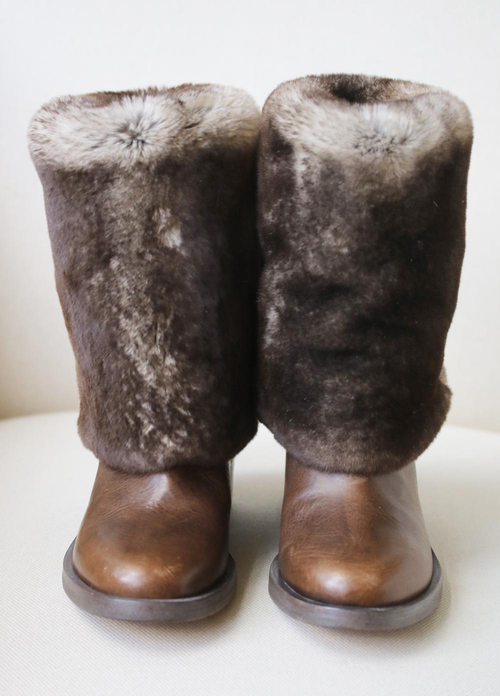 Chanel rabbit-fur and leather ankle boots perfect for the colder days. 
Sits above the ankle. 
Fold-over rabbit-fur flap. 
Slip-on. 
Stacked heel. 
Calfskin leather. 
Fur type: rabbit. 
Fur Origin: Spain. 
Colour: brown. 
Does not come with a box.