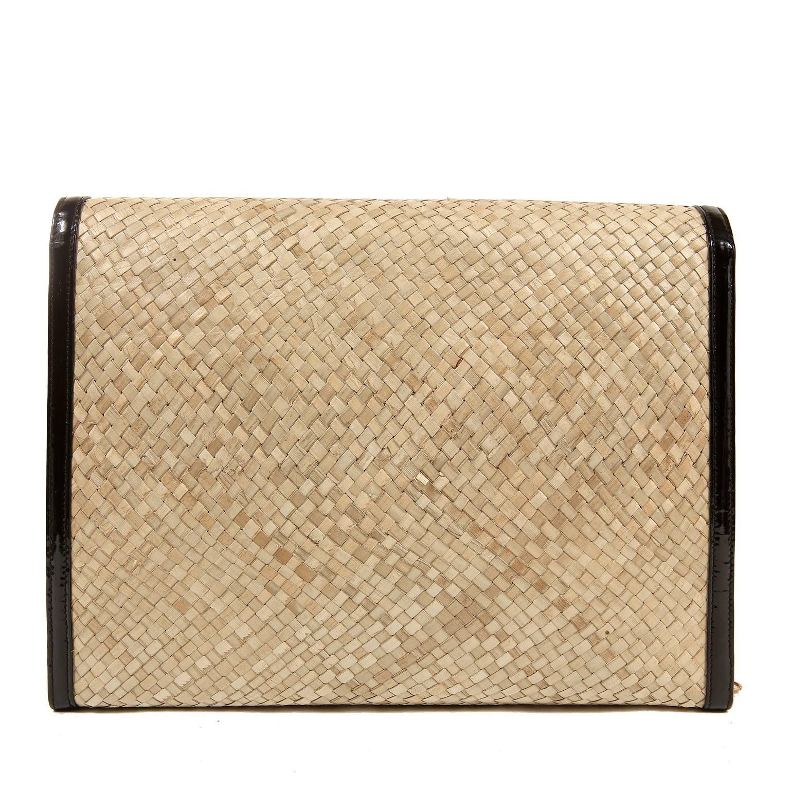 Amen Wardy for Chanel Raffia Woven Flap Bag- MINT Condition 
Woven Raffia flap bag is surrounded with sturdy black patent leather trim and sides.  Black patent interlocking CC adorns the front.  Black leather interior is extremely clean.  Elegant