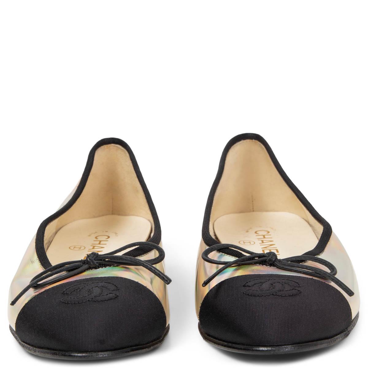 100% authentic Chanel classic ballet flats in iridescent rainbow with a black grosgrain tip and trimming. Spring-summer 2018 collection. Brand new with a small scratch on the right shoe. Come with dust bag. Rubber sole got added.