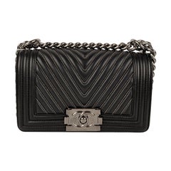 Collector & Rare Chanel Sac du Soir shoulder bag in black quilted Satin, GHW