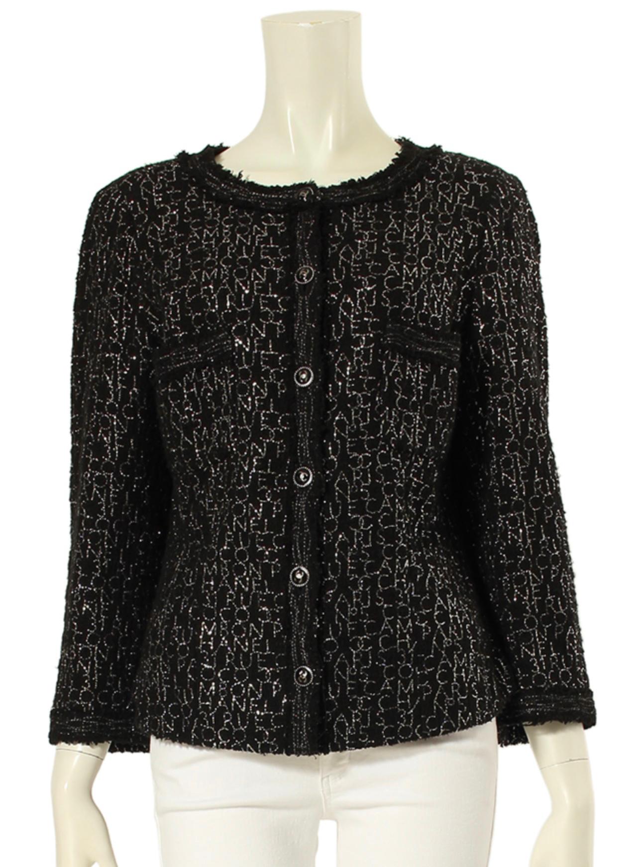 Absolutely stunning Chanel black tweed jacket with shimmering Logos and 31 Rue Cambon lettering -- a rare and collectible piece!
- CC logo buttons
- black silk lining, chain link at hem
Size mark 38 FR. Pristine condition.