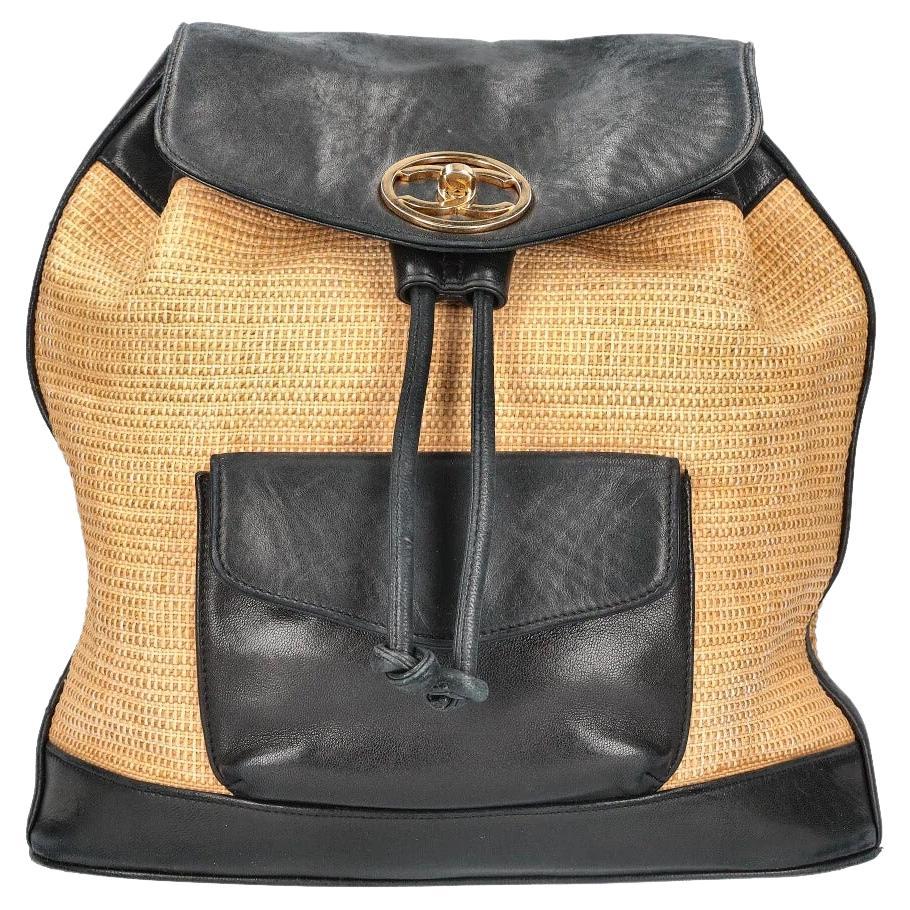 Chanel Rare sac à dos vintage en cuir noir et raphia naturel en rotin, années 90 en vente