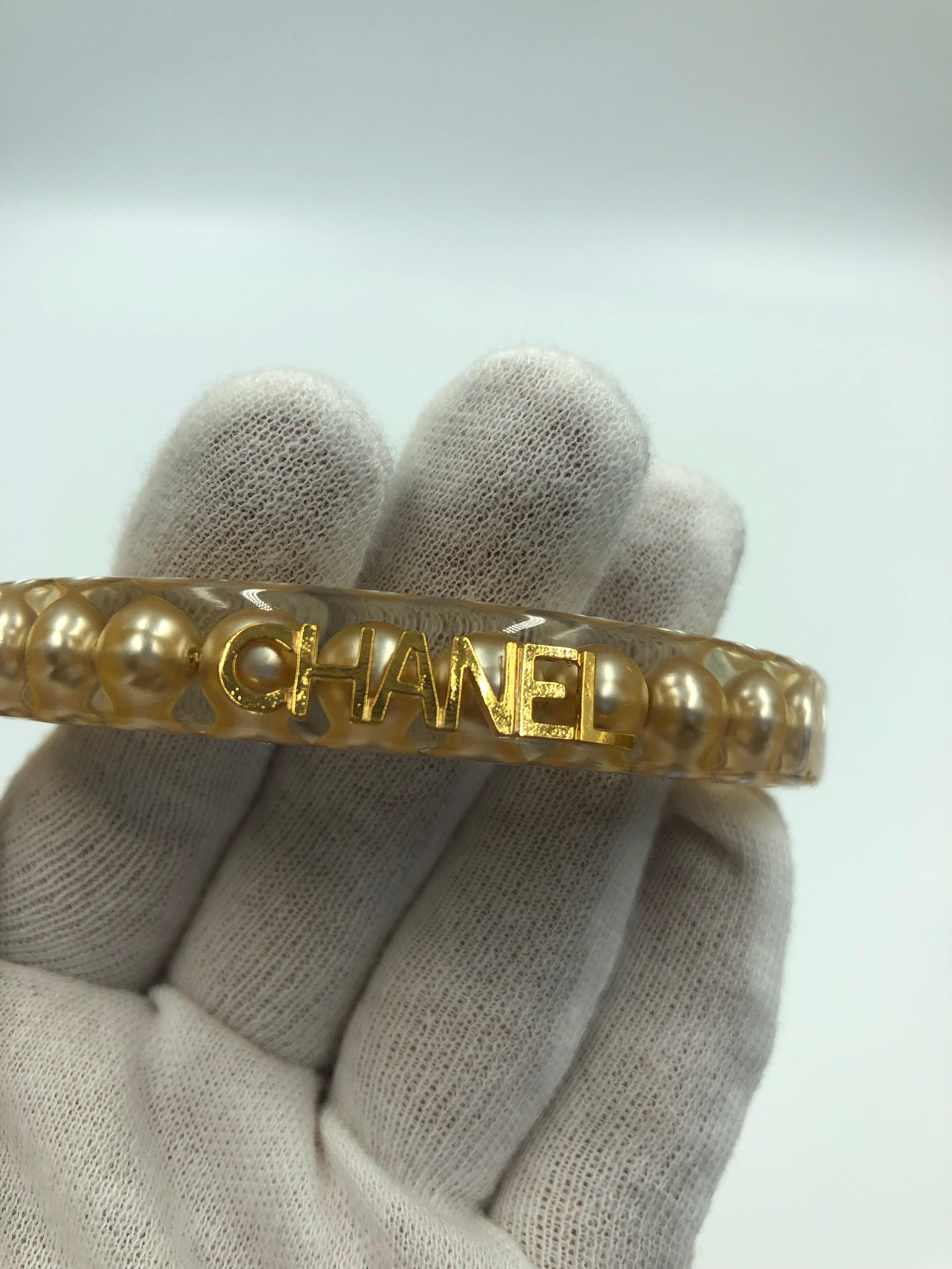 Women's or Men's Chanel Rare Authentic Lucite Faux Pearl Bangle Bracelet For Sale